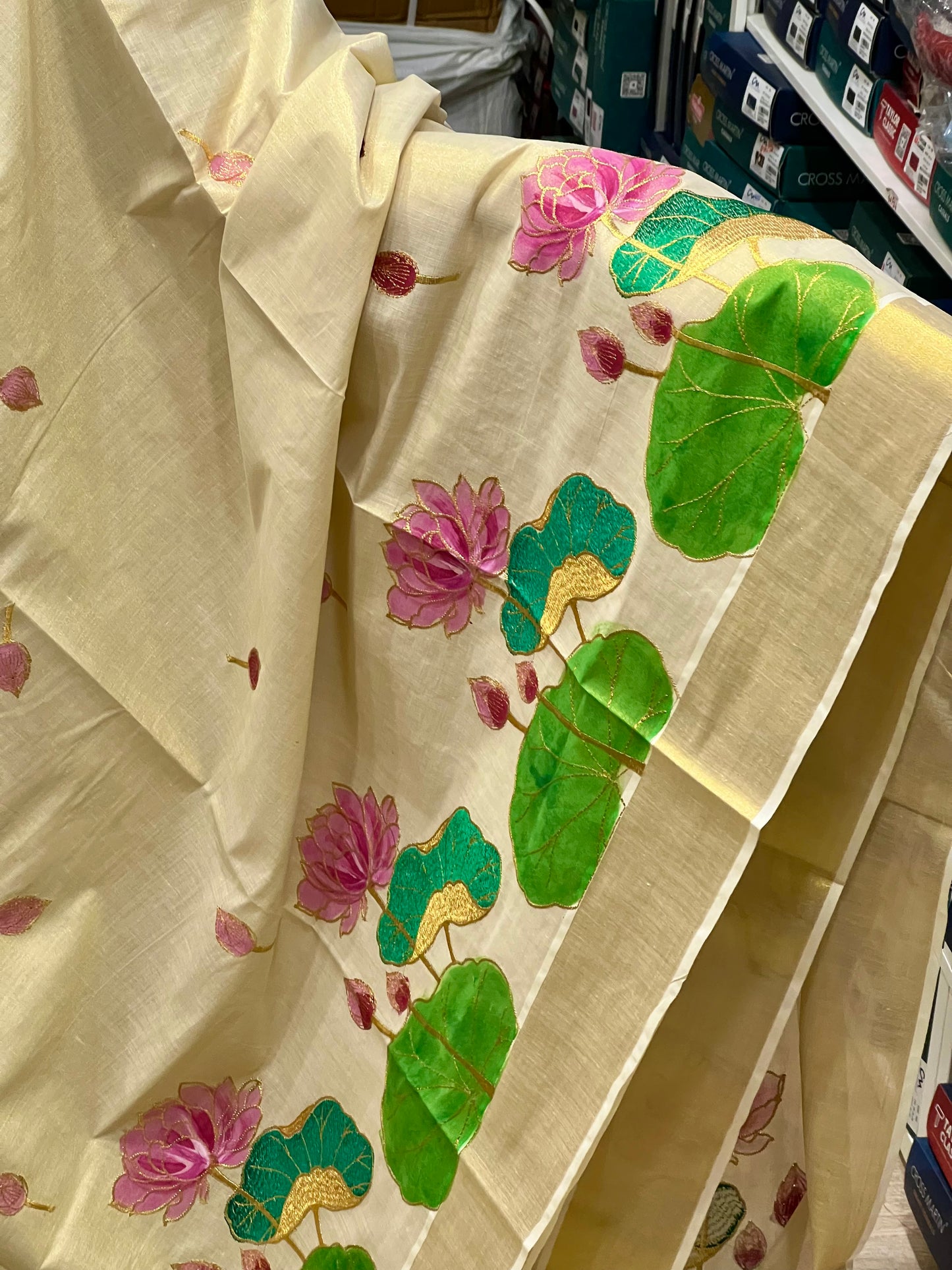 Southloom Tissue Kerala Kasavu Saree with Hand Painted Embroidery Lotus Design