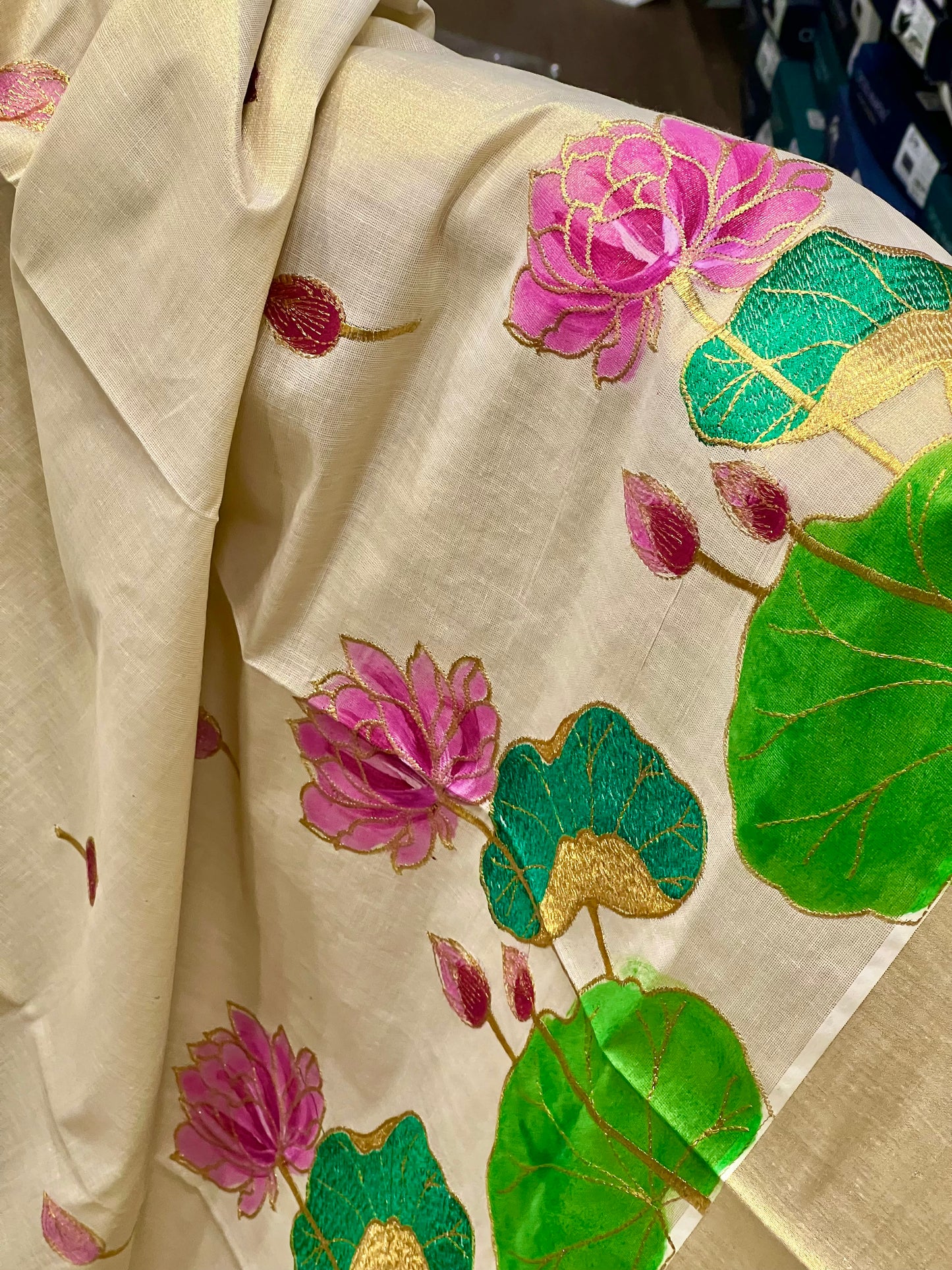 Southloom Tissue Kerala Kasavu Saree with Hand Painted Embroidery Lotus Design