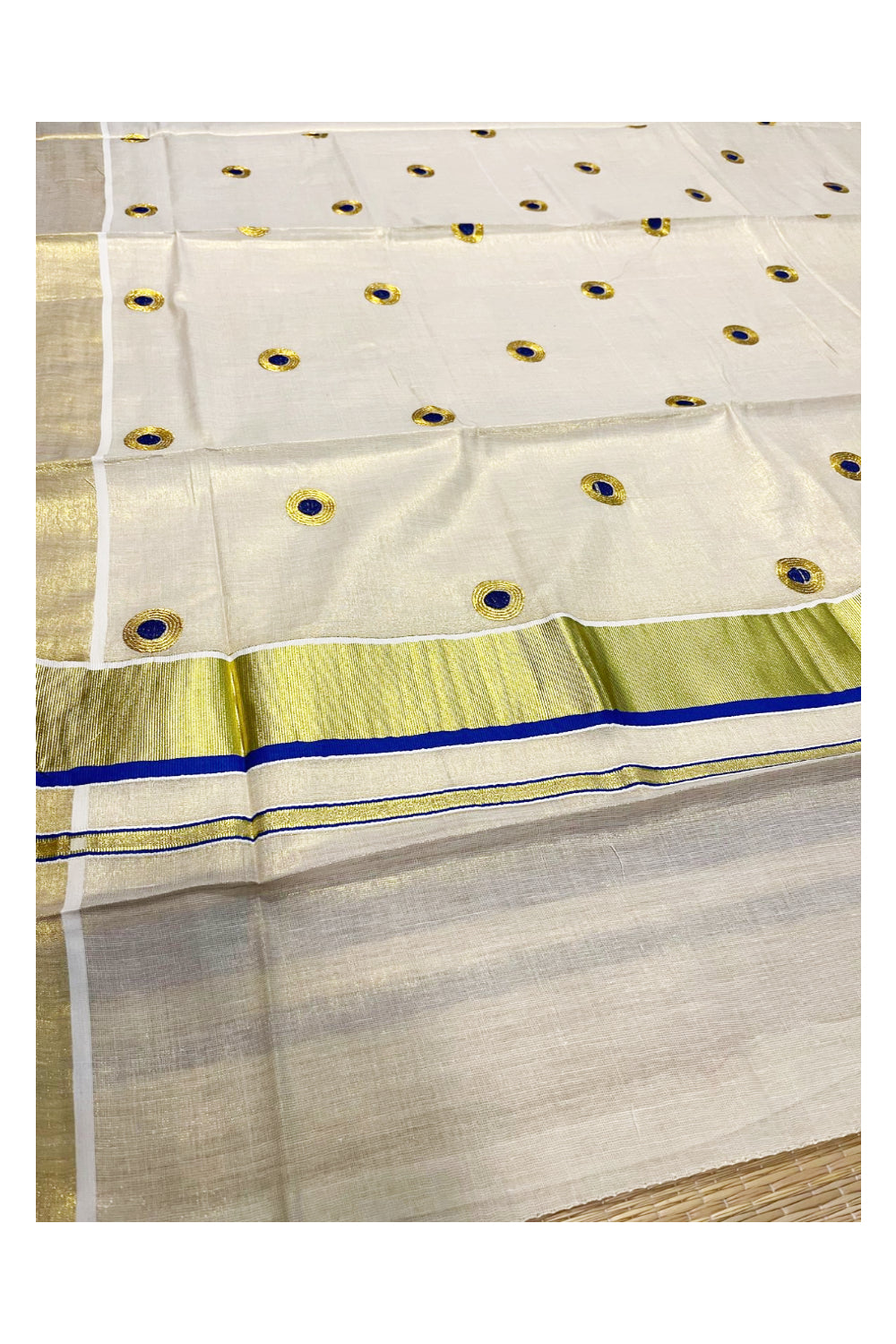 Kerala Tissue Kasavu Saree With Blue And Golden Polka Embroidery Works on Body