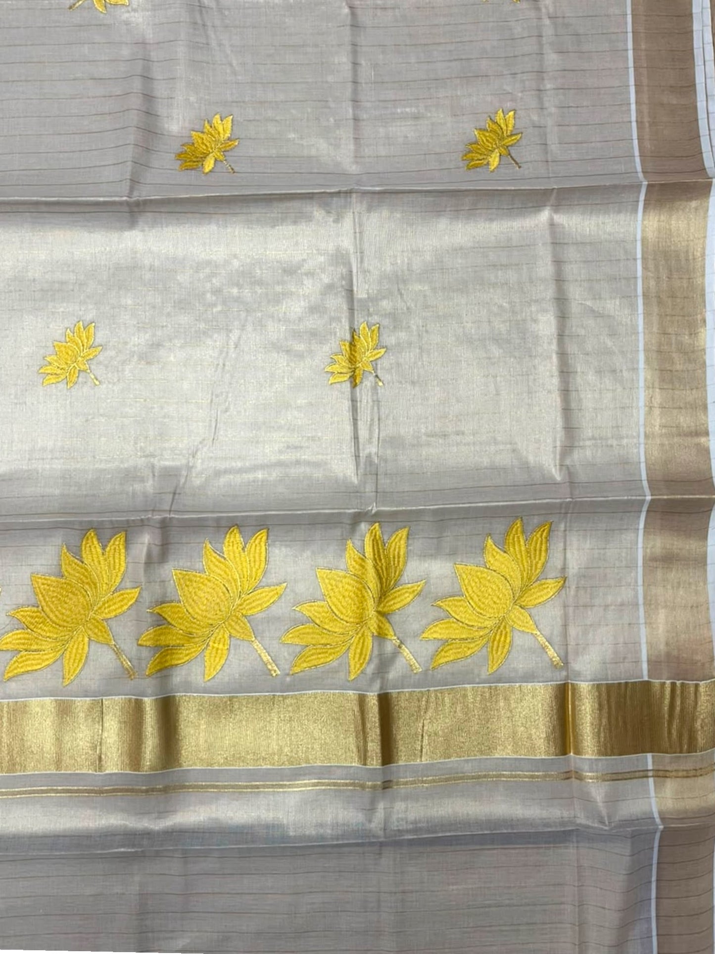 Southloom Kerala Tissue Lines Kasavu Saree with Yellow Lotus Embroidery Works