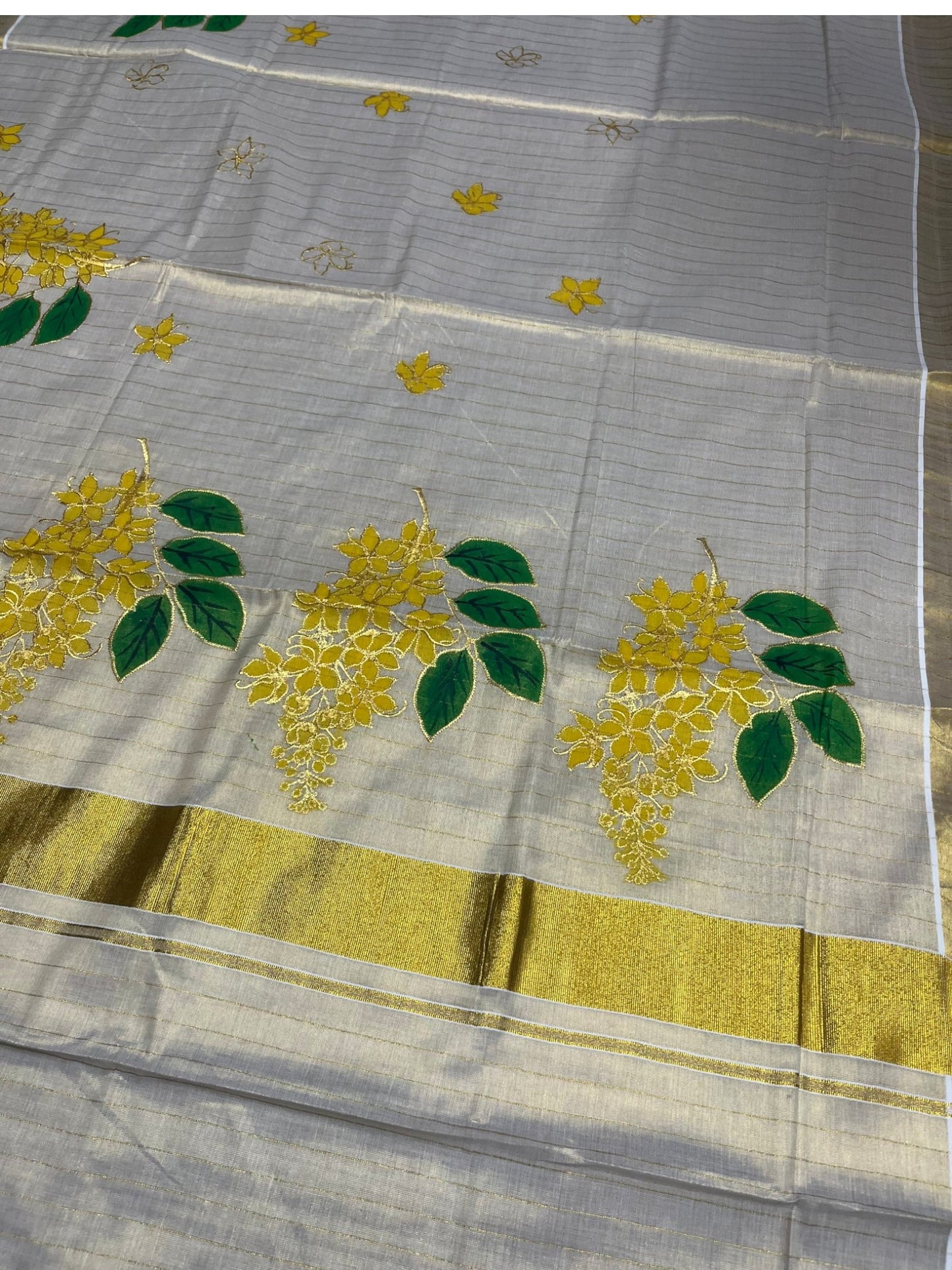 Southloom Tissue Kerala Kasavu Saree with Kanikonna Embroidery Work on Body