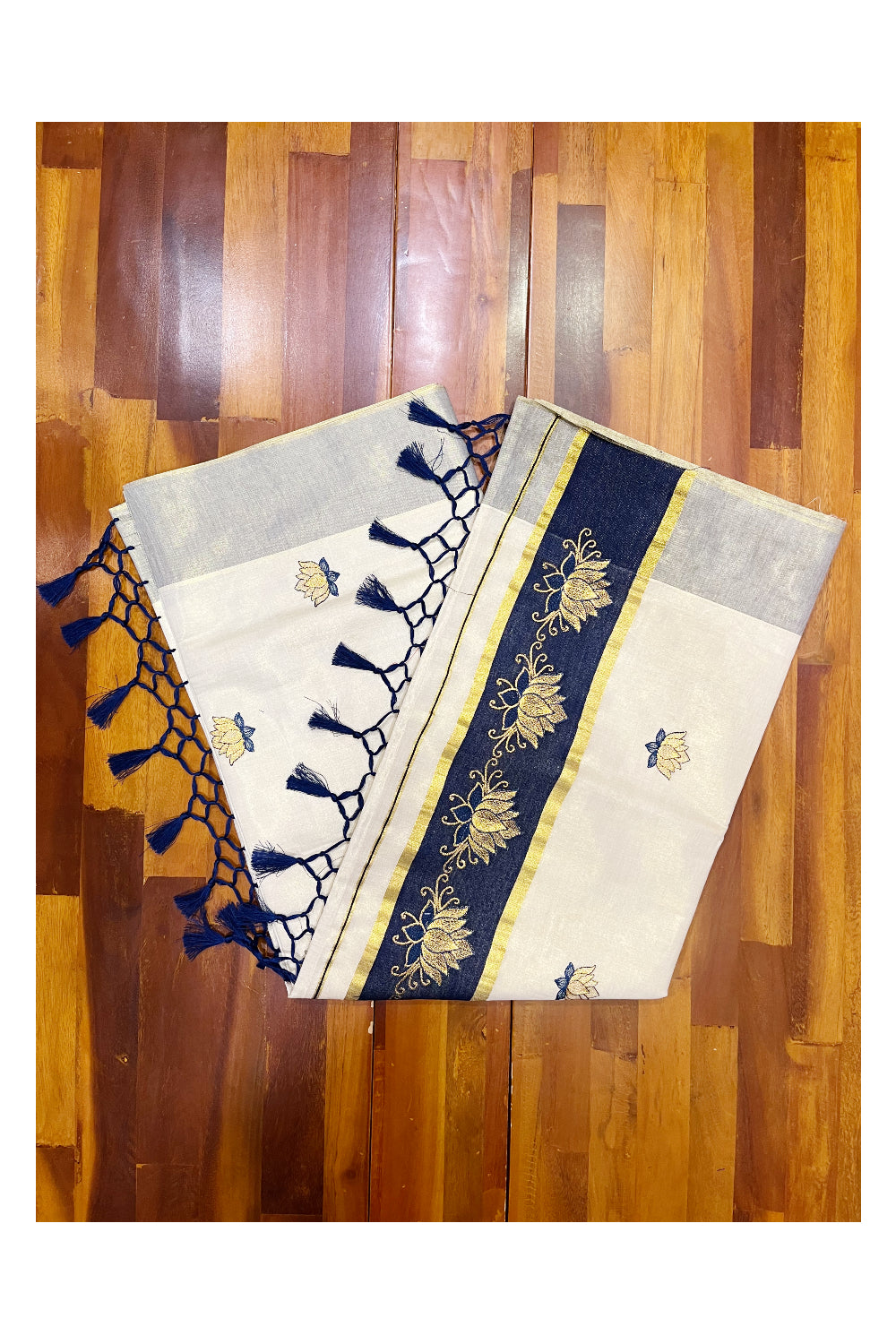 Southloom Kerala Tissue Kasavu Saree with Blue And Golden Lotus Embroidary Designs on Body