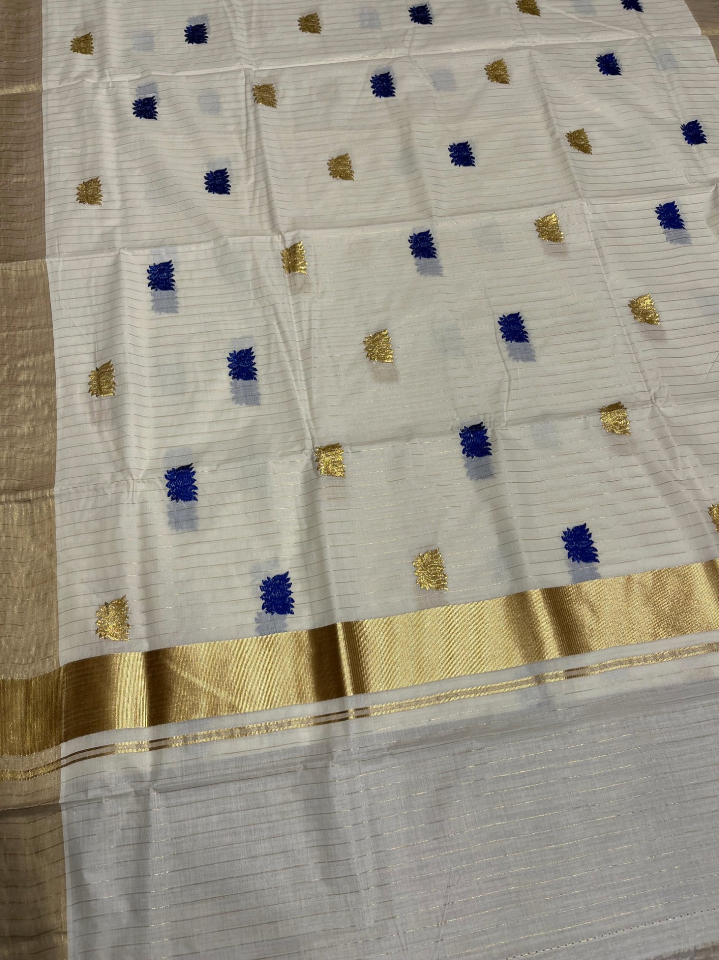Southloom Kerala Cotton Kasavu Line Saree with Blue Lotus Embroidery Works