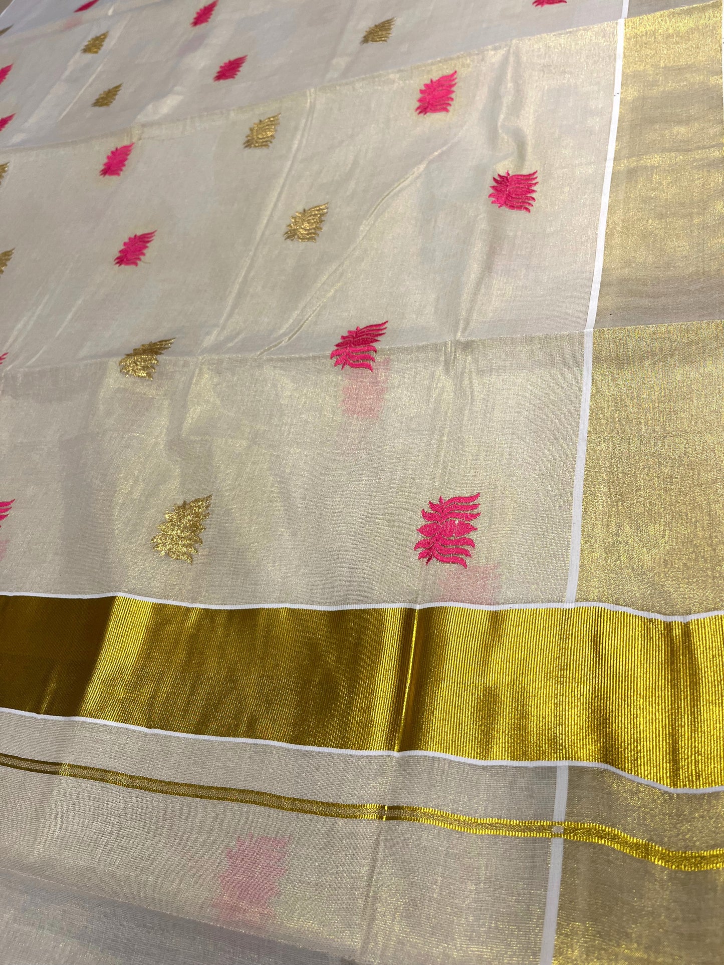 Southloom Kerala Tissue Plain Kasavu Saree with Pink And Gold Lotus Embroidery Works