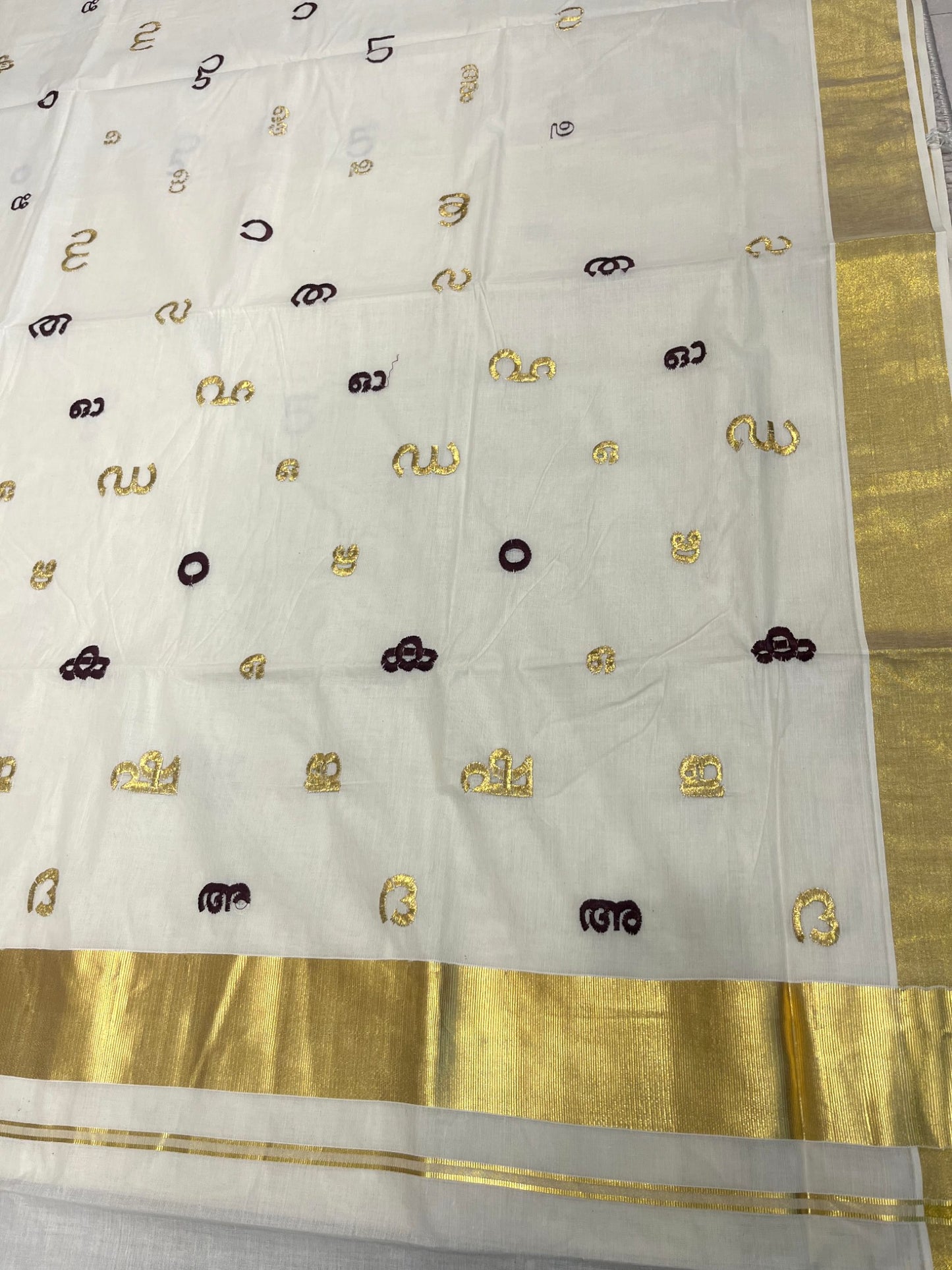 Southloom Kerala Cotton Kasavu Saree with Gold and Brown Malayalam Aksharamala Embroidery Work on Body