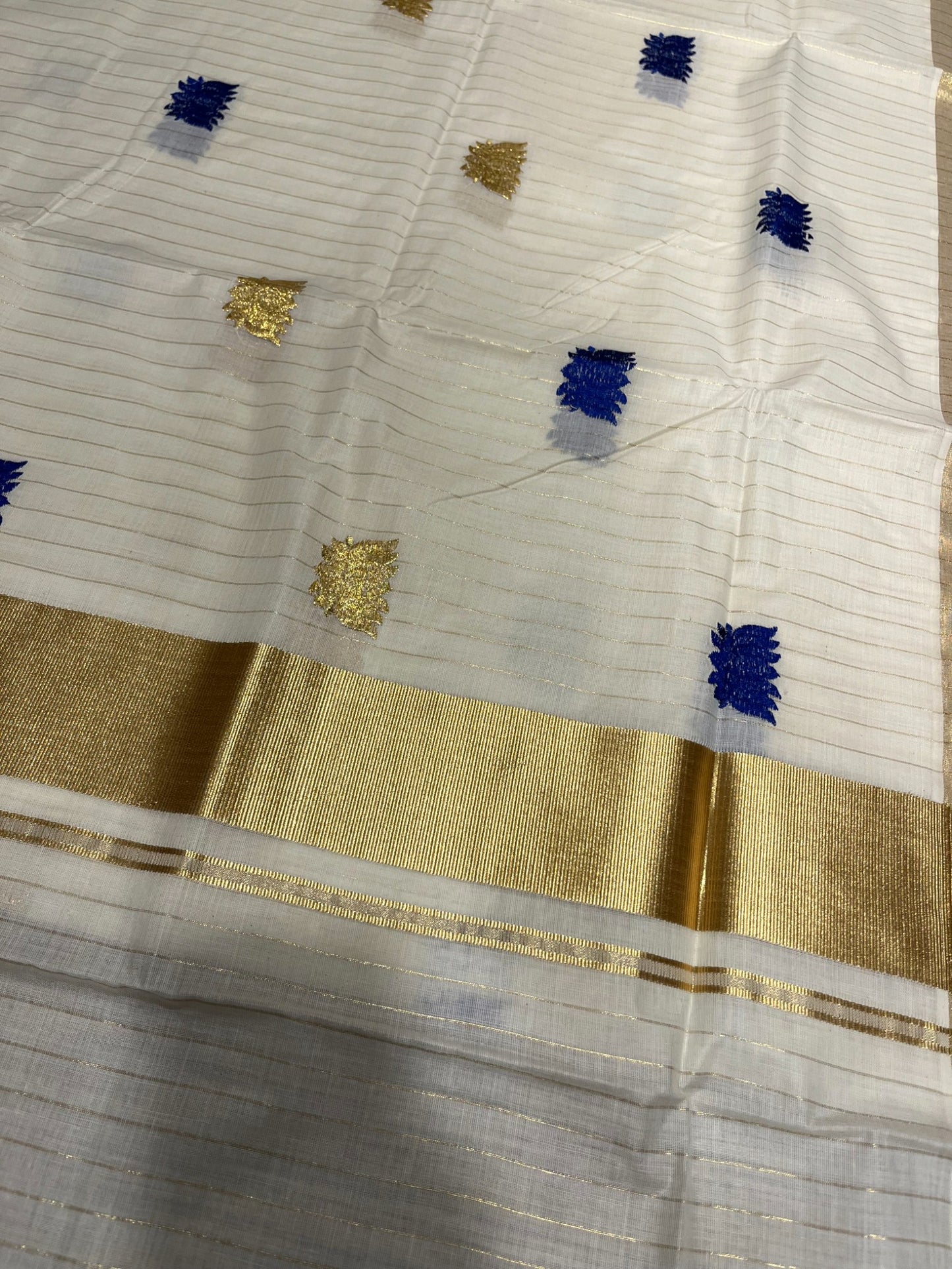 Southloom Kerala Cotton Kasavu Line Saree with Blue Lotus Embroidery Works