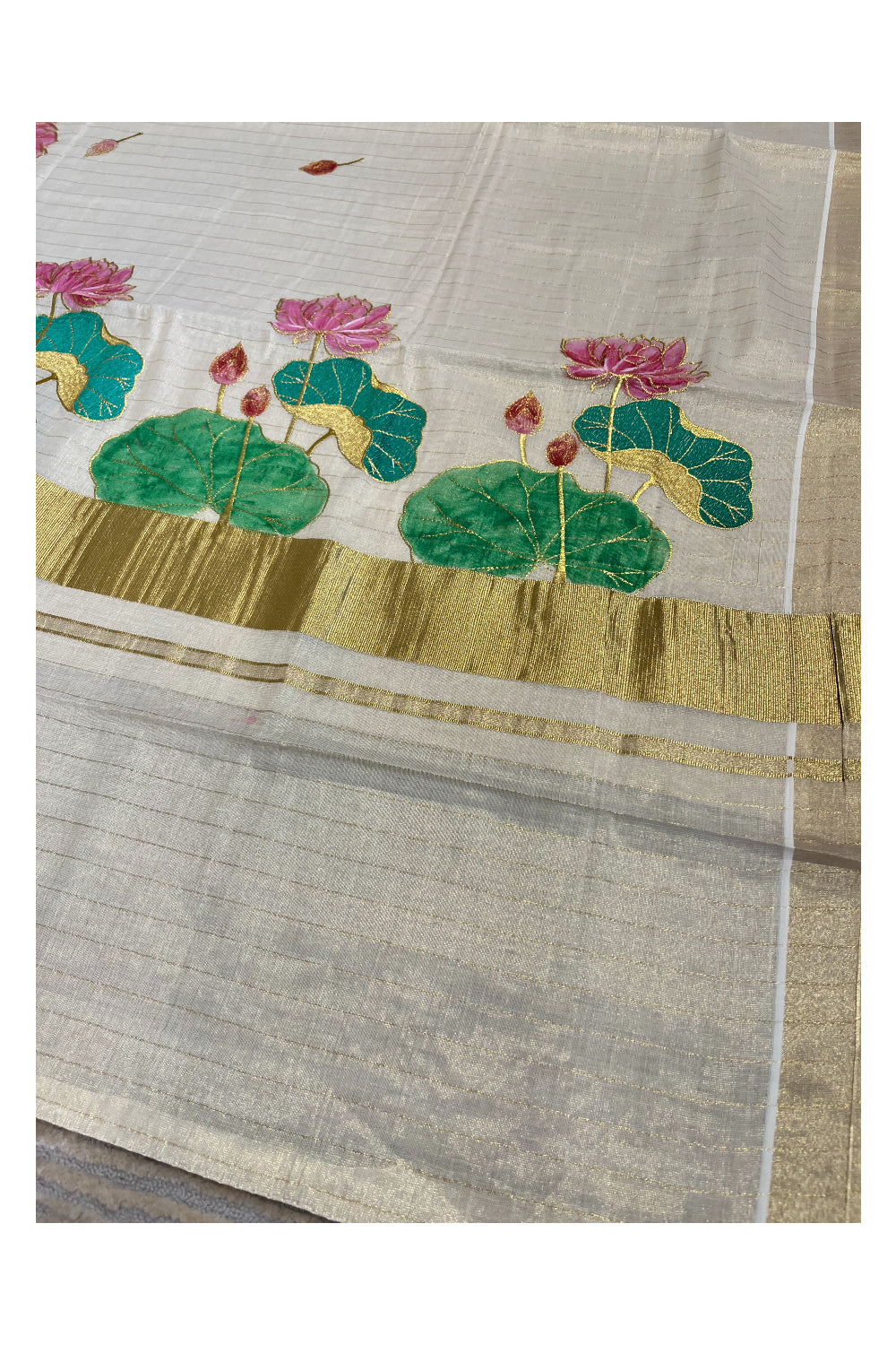 Southloom Tissue Kerala Kasavu Saree with Hand Painted Embroidery Lotus Design