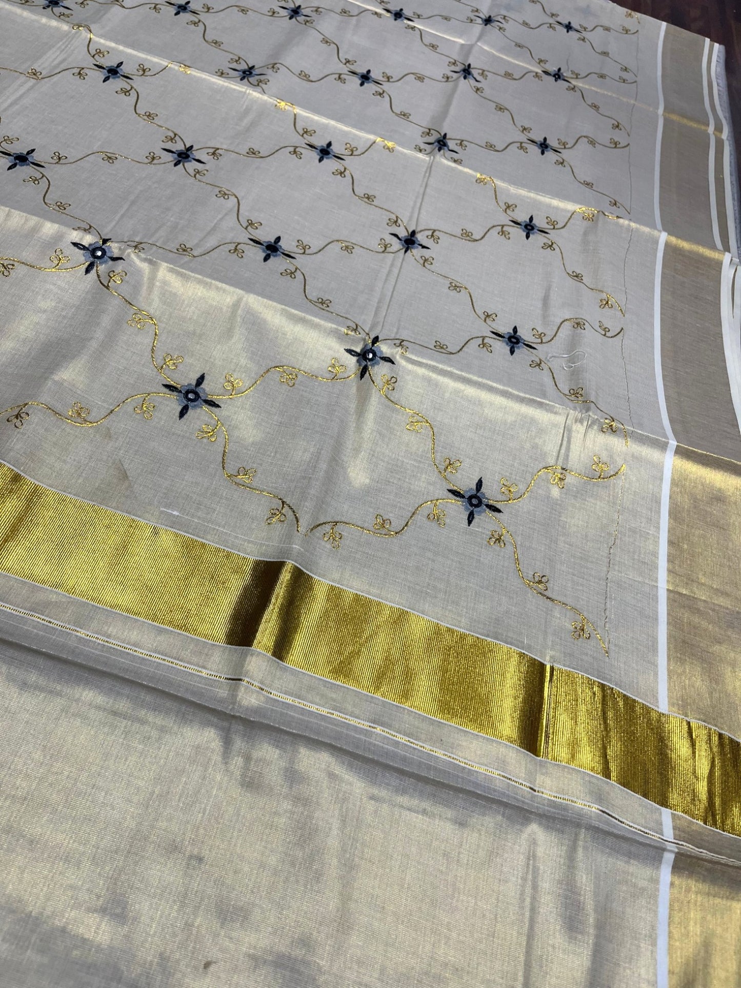 Southloom Tissue Kerala Kasavu Plain Saree with Embroidery Designs on Body