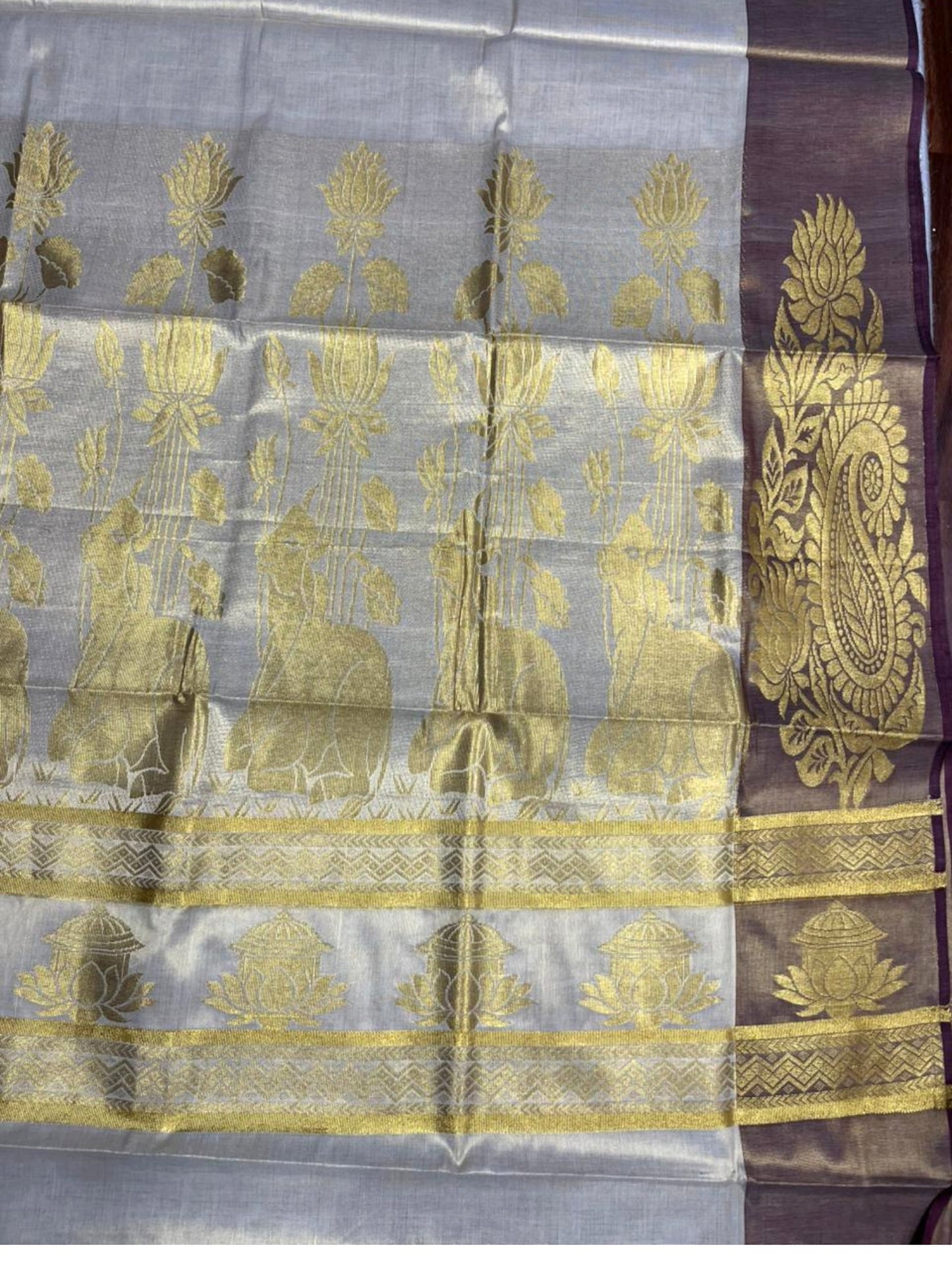 Southloom Kerala Tissue Kasavu Heavy Work Saree with Nandhi Design And Purple Border SL483