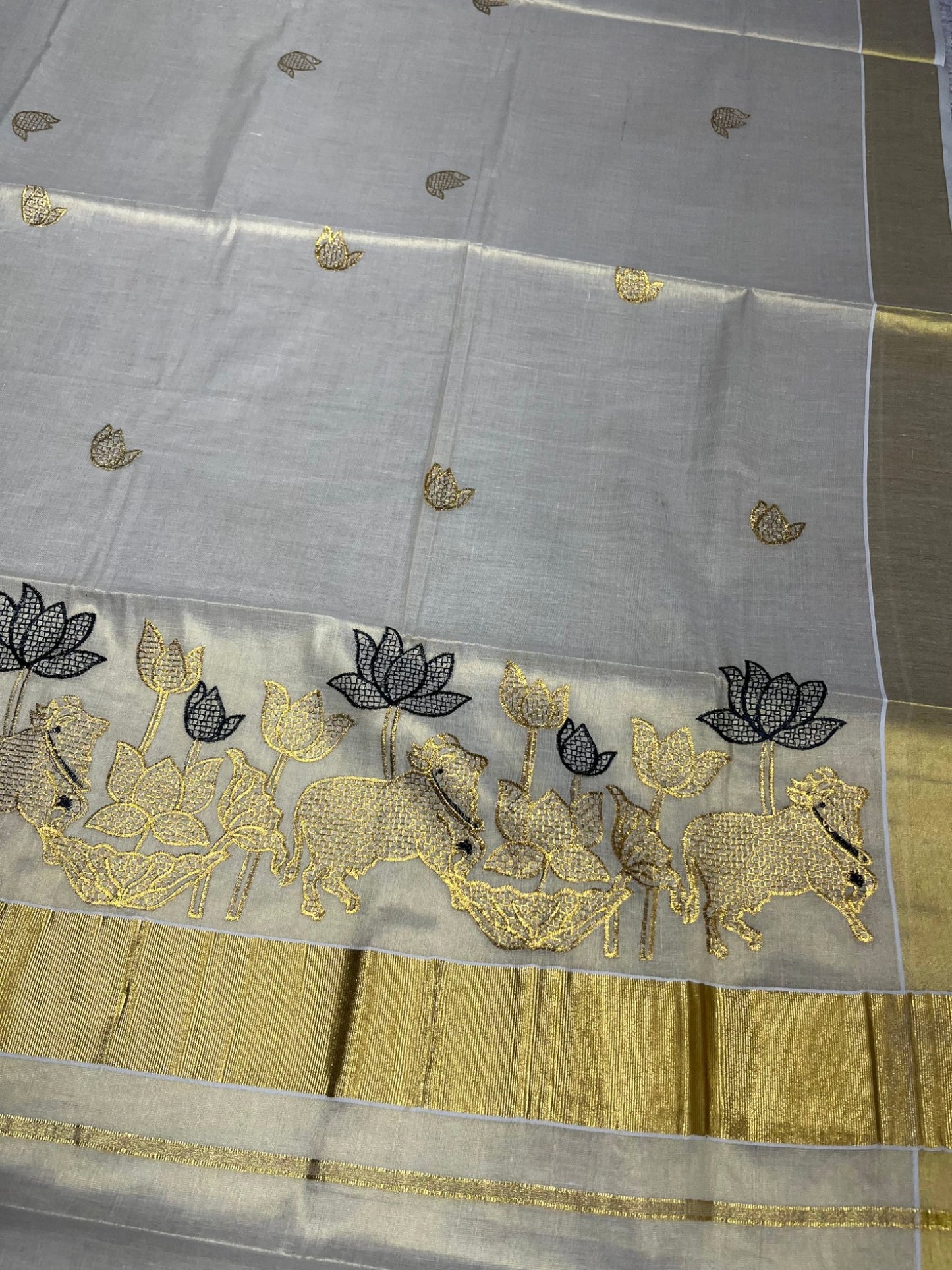 Southloom Tissue Kerala Kasavu Saree with Black & Golden Embroidery Works