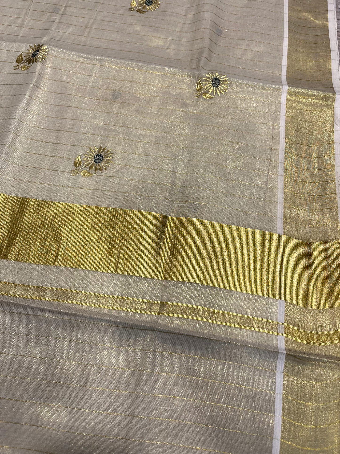 Kerala Tissue Kasavu Stripes Saree with Floral Embroidery Design on Body