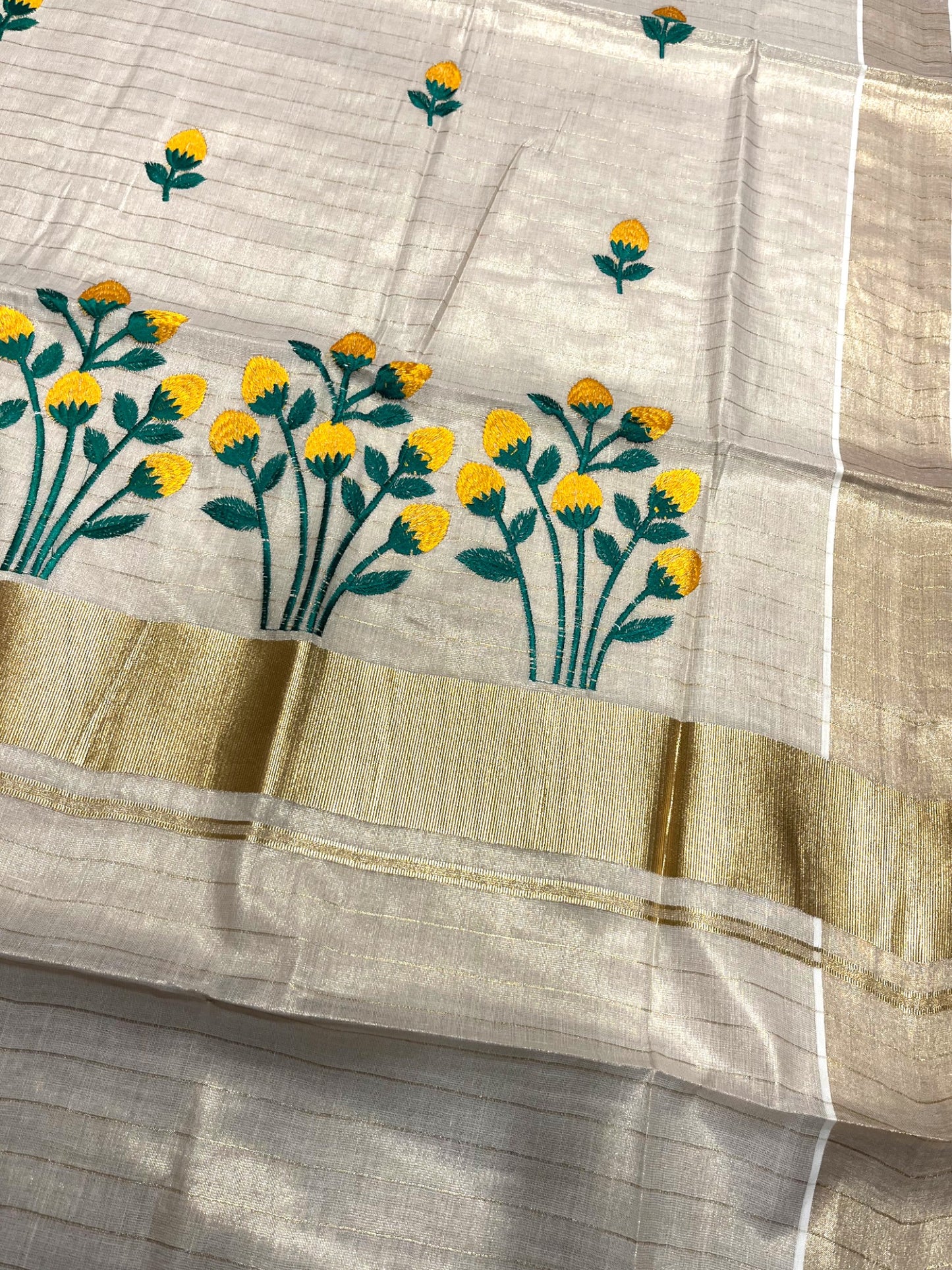 Southloom Tissue Kerala Kasavu Saree with Floral Embroidery Design in Yellow