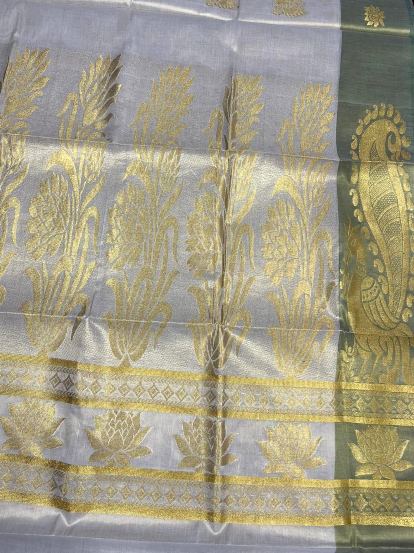 Southloom Kerala Tissue Kasavu Heavy Work Saree with Peacock Design And Olive Green Border SL483