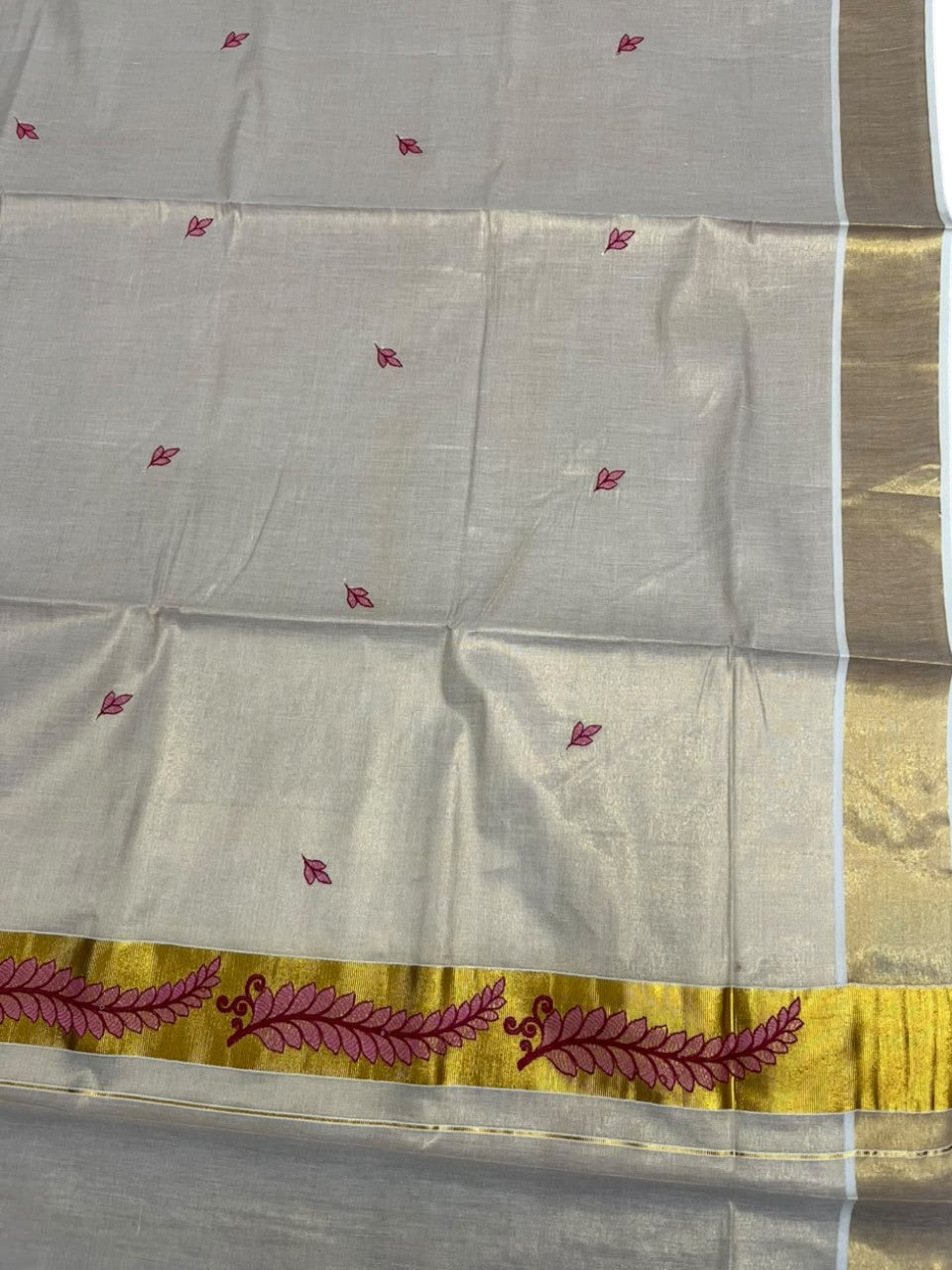 Southloom Tissue Kerala Kasavu Saree with Floral Embroidery Design On Border