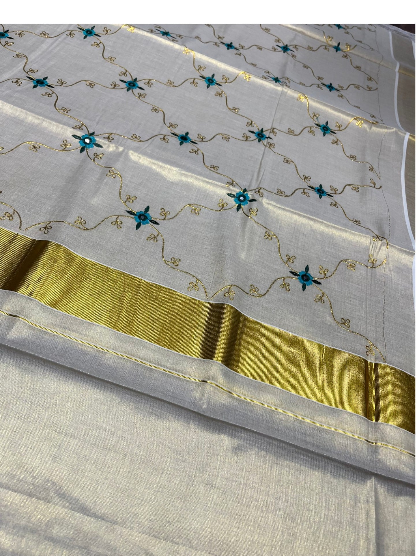 Southloom Tissue Kerala Kasavu Plain Saree with Embroidery Designs on Body