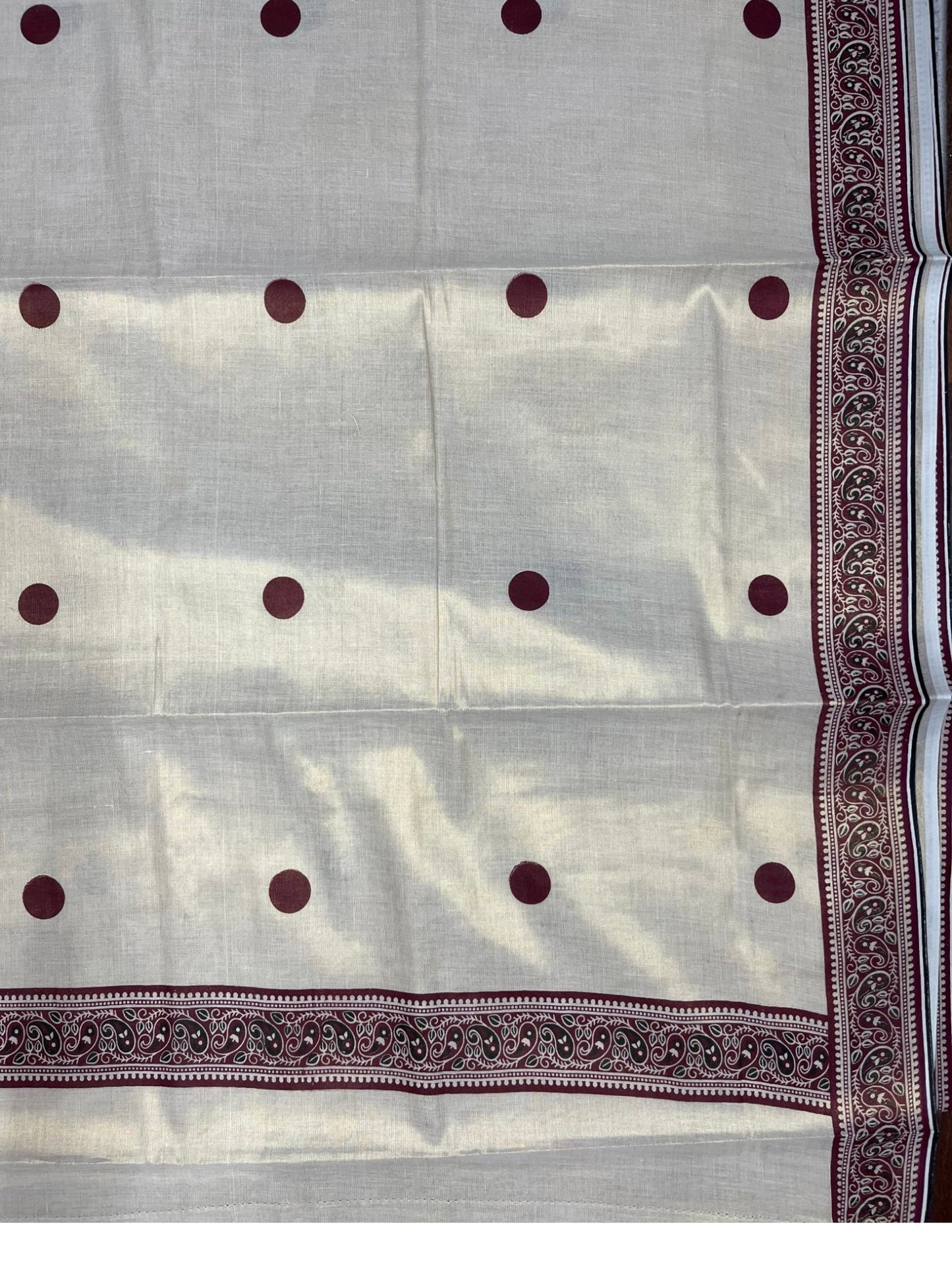 Southloom Kerala Tissue Plain Saree With Maroon Polk Dots on Body and Floral Digital Prints in Borders