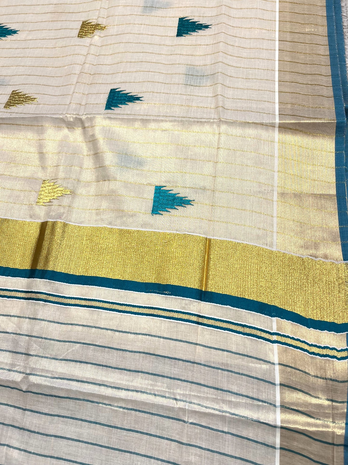 Kerala Tissue Kasavu Stripes Saree with Peacock Green and Gold Temple Embroidery Design on Body