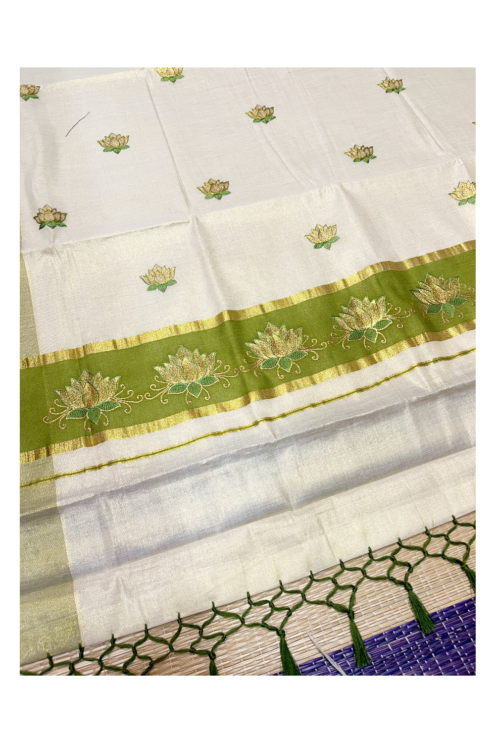 Southloom Kerala Tissue Kasavu Saree with Olive Green And Golden Lotus Embroidary Designs on Body