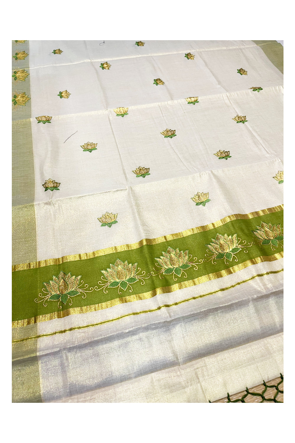 Southloom Kerala Tissue Kasavu Saree with Olive Green And Golden Lotus Embroidary Designs on Body