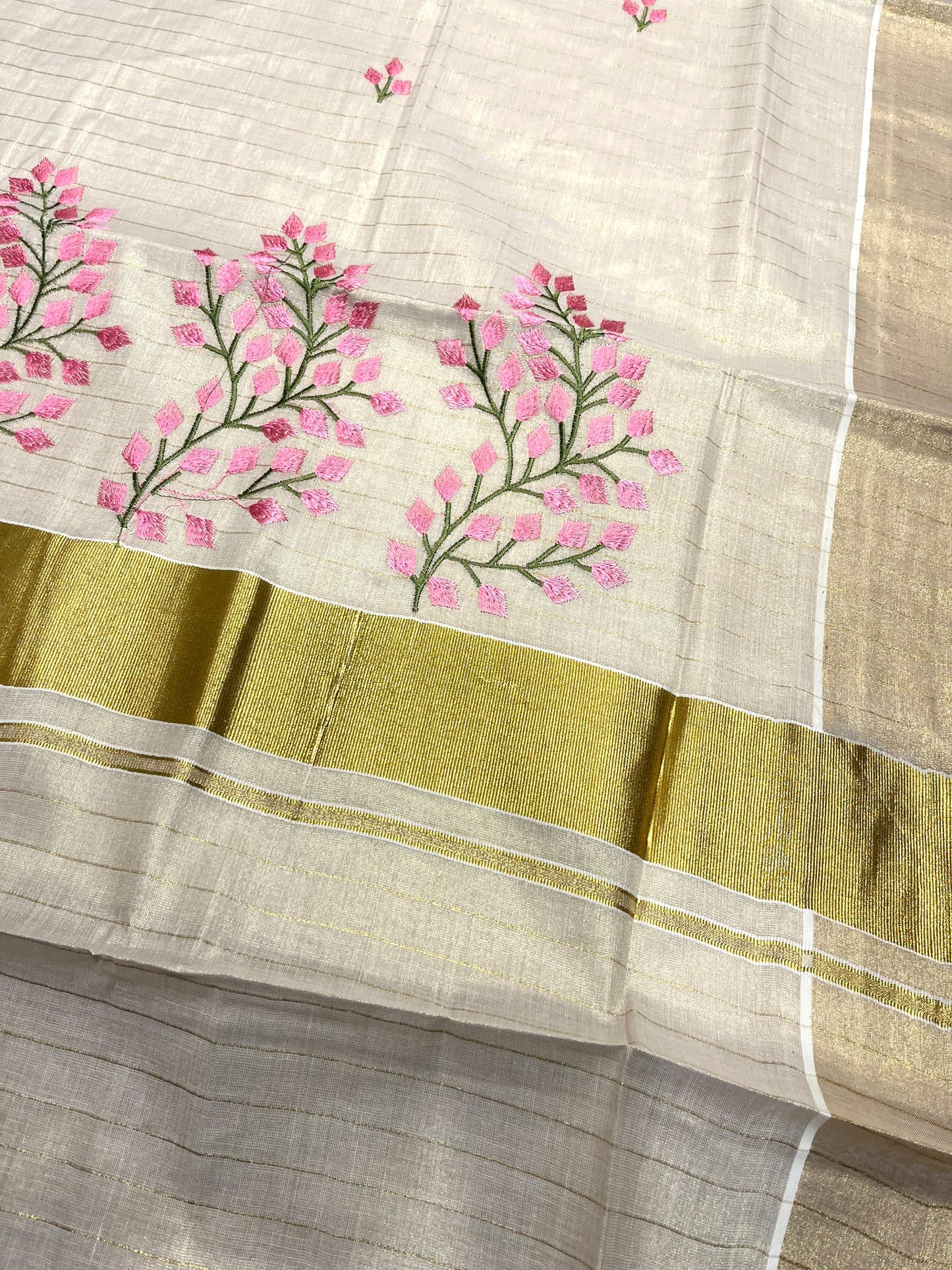 Southloom Tissue Kerala Kasavu Saree with Floral Embroidery Design