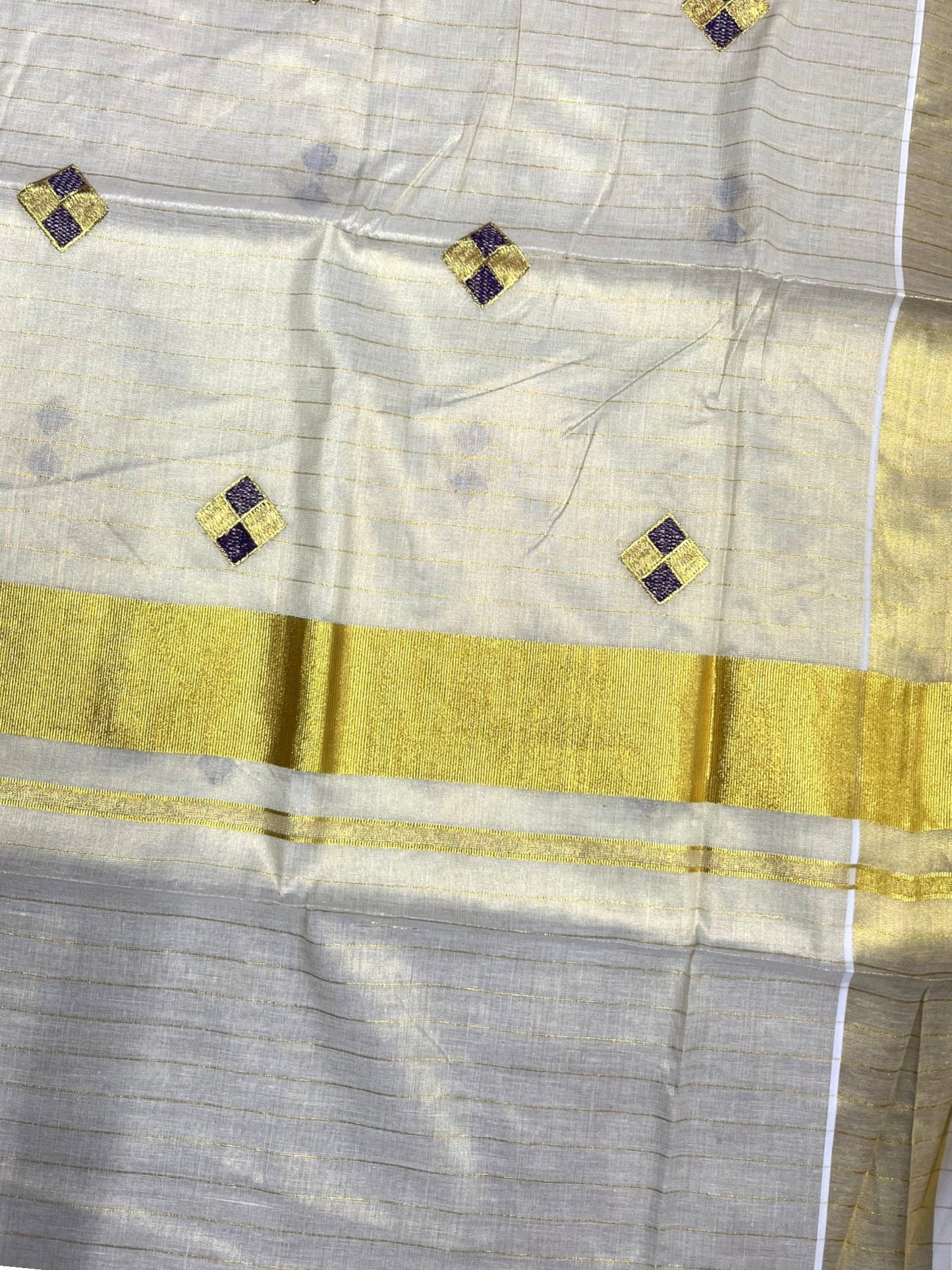 Southloom Kerala Tissue Kasavu Striped Saree with Diagonal Woven Designs in Purple And Gold Body Work