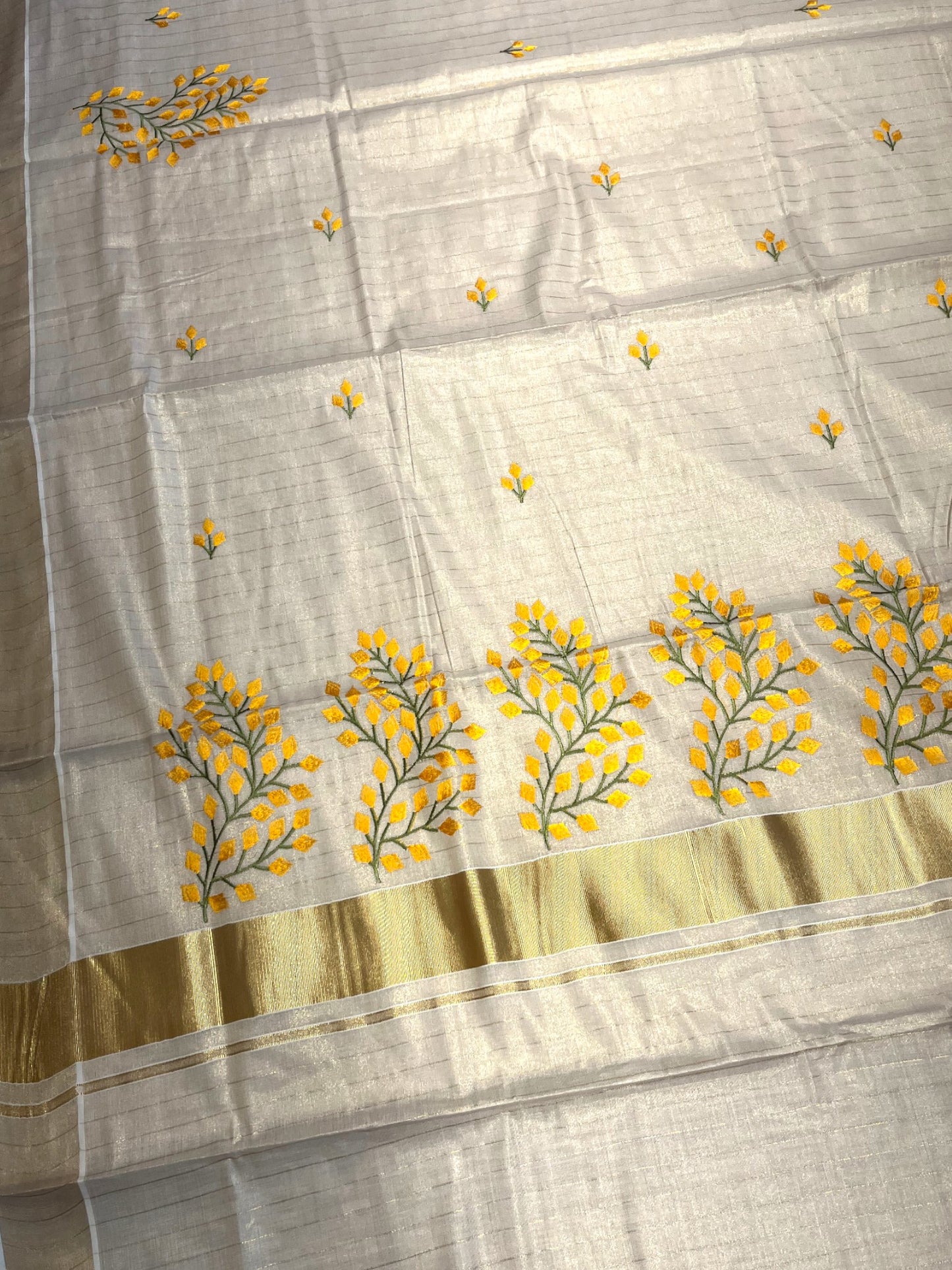 Southloom Tissue Kerala Kasavu Saree with Floral Embroidery Design