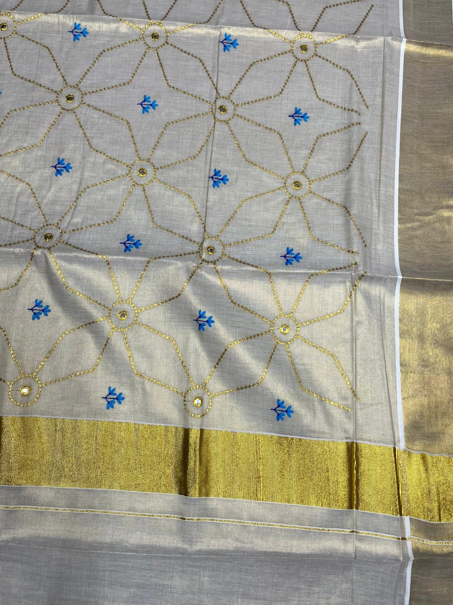 Southloom Kerala Tissue Kasavu Saree with Floral Embroidery Work on Body in Blue