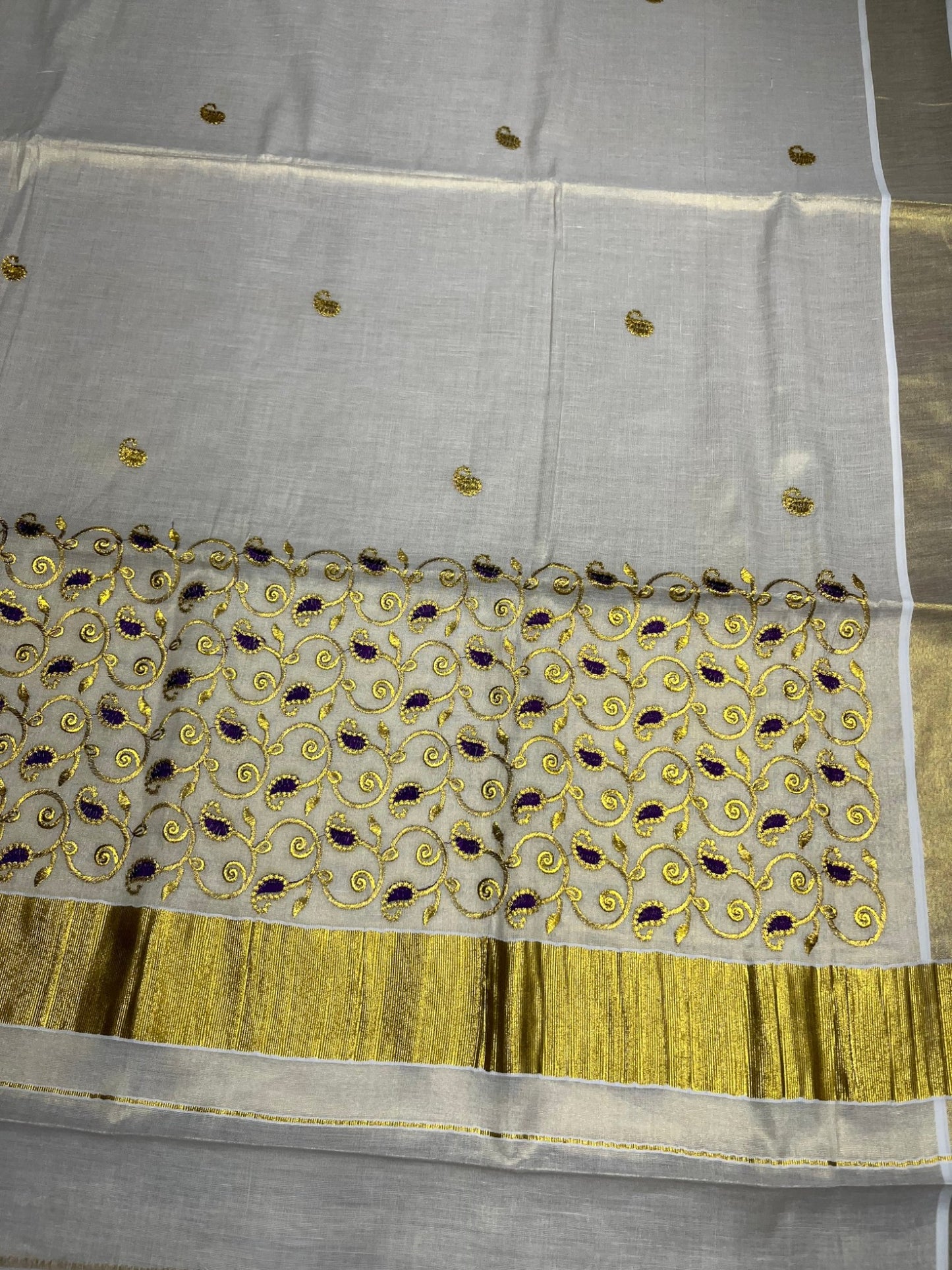 Southloom Tissue Kerala Kasavu Plain Saree with Purple &Gold Embroidery Designs on Body