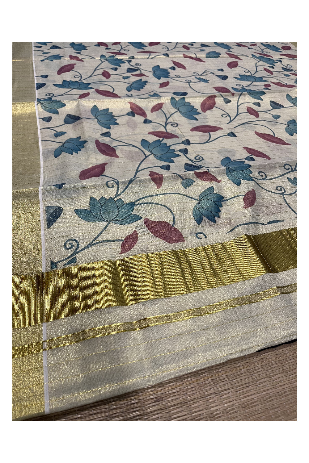 Kerala Tissue Kasavu Lines Saree with Blue Floral Kalamkari Design