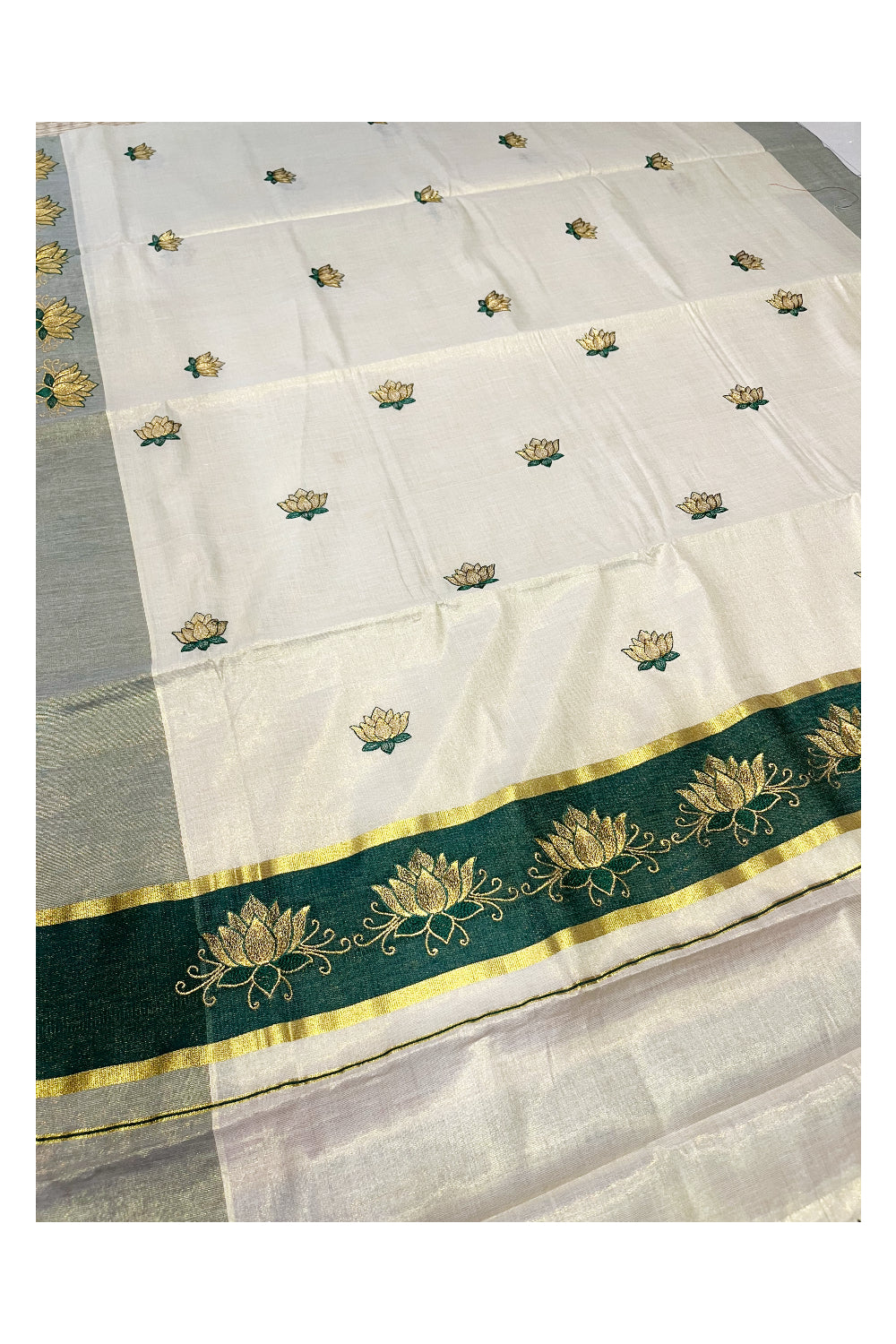 Southloom Kerala Tissue Kasavu Saree with Green And Golden Lotus Embroidary Designs on Body
