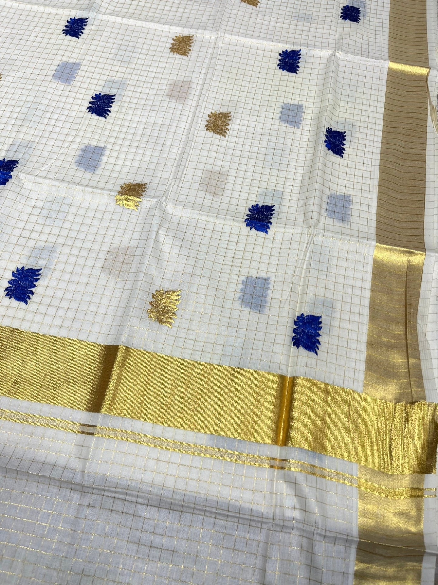 Southloom Cotton Kerala Kasavu Check Saree with Lotus Embroidery Design in Blue