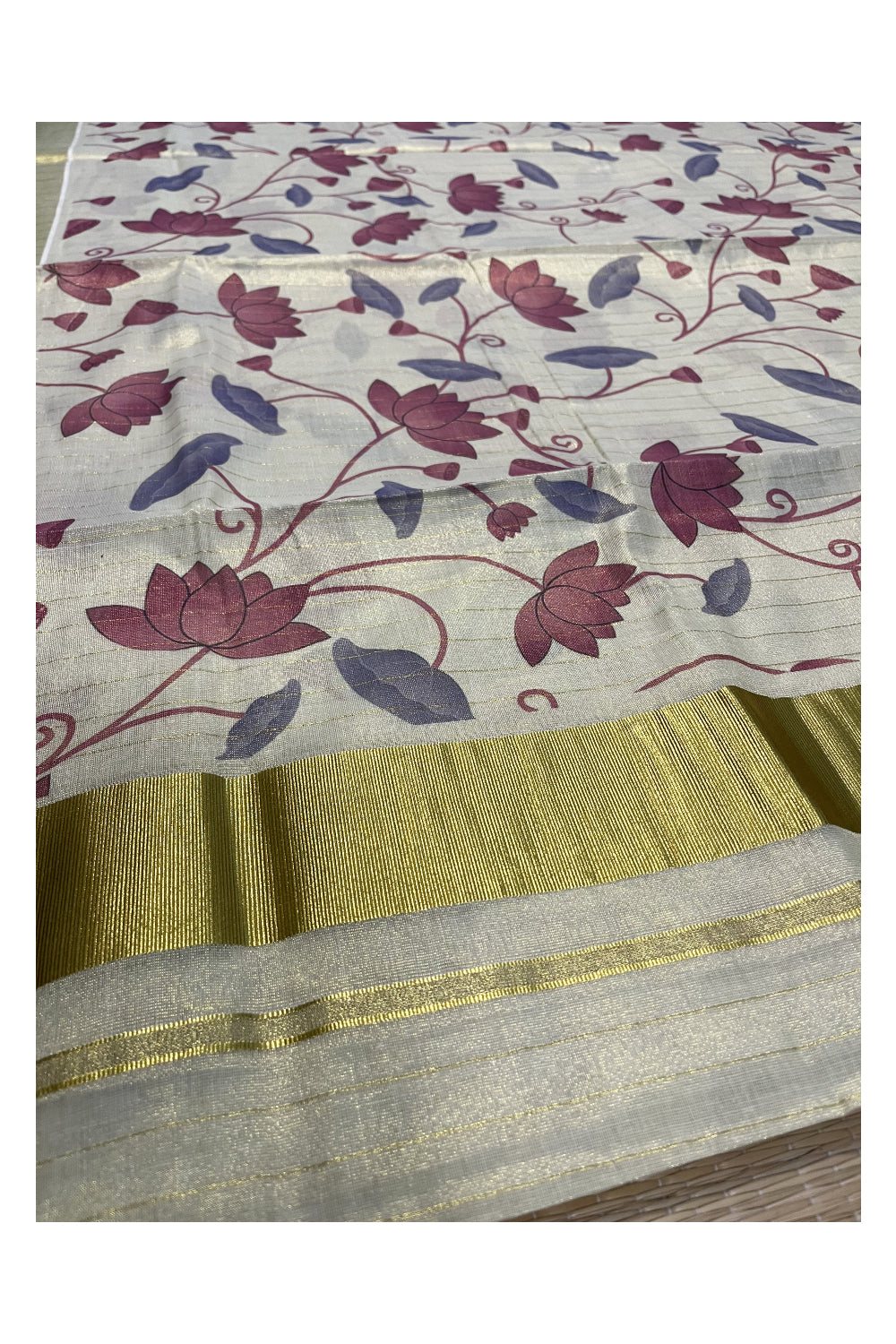 Kerala Tissue Kasavu Lines Saree with Purple Floral Kalamkari Design