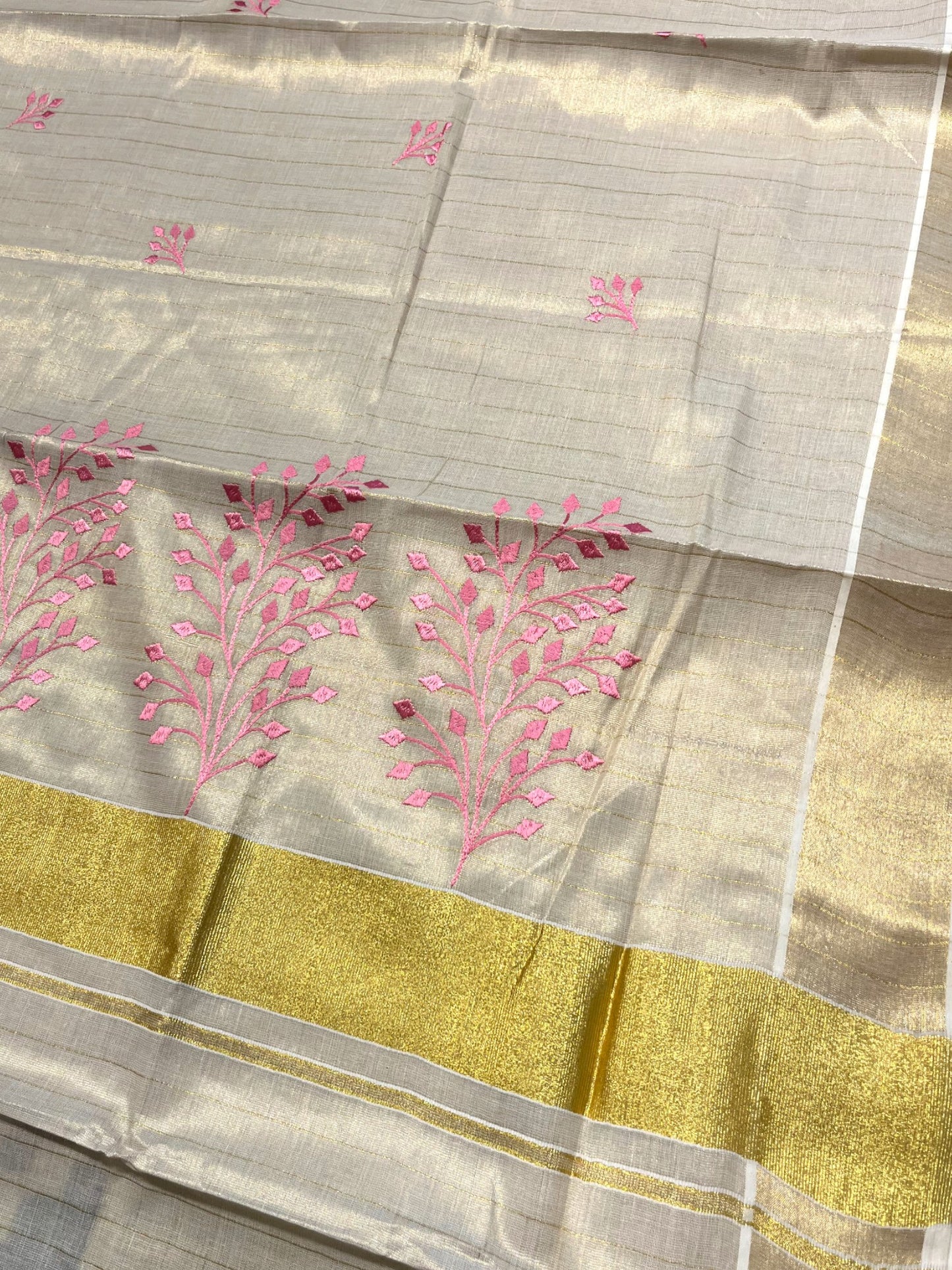 Southloom Tissue Kerala Kasavu Saree with Floral Embroidery Design