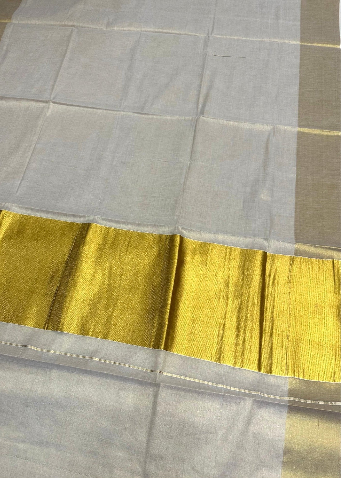 Southloom Kerala Tissue Saree With Kasavu Borders And 10 Inch Borders On The Pallu