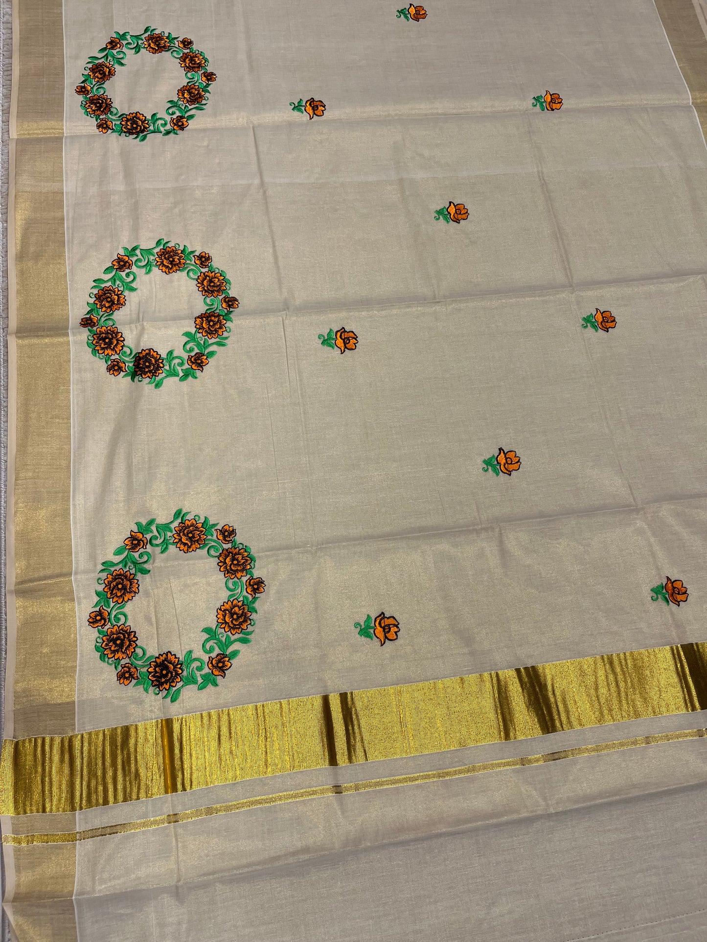 Southloom Tissue Kerala Kasavu Saree with Floral Embroidery Design