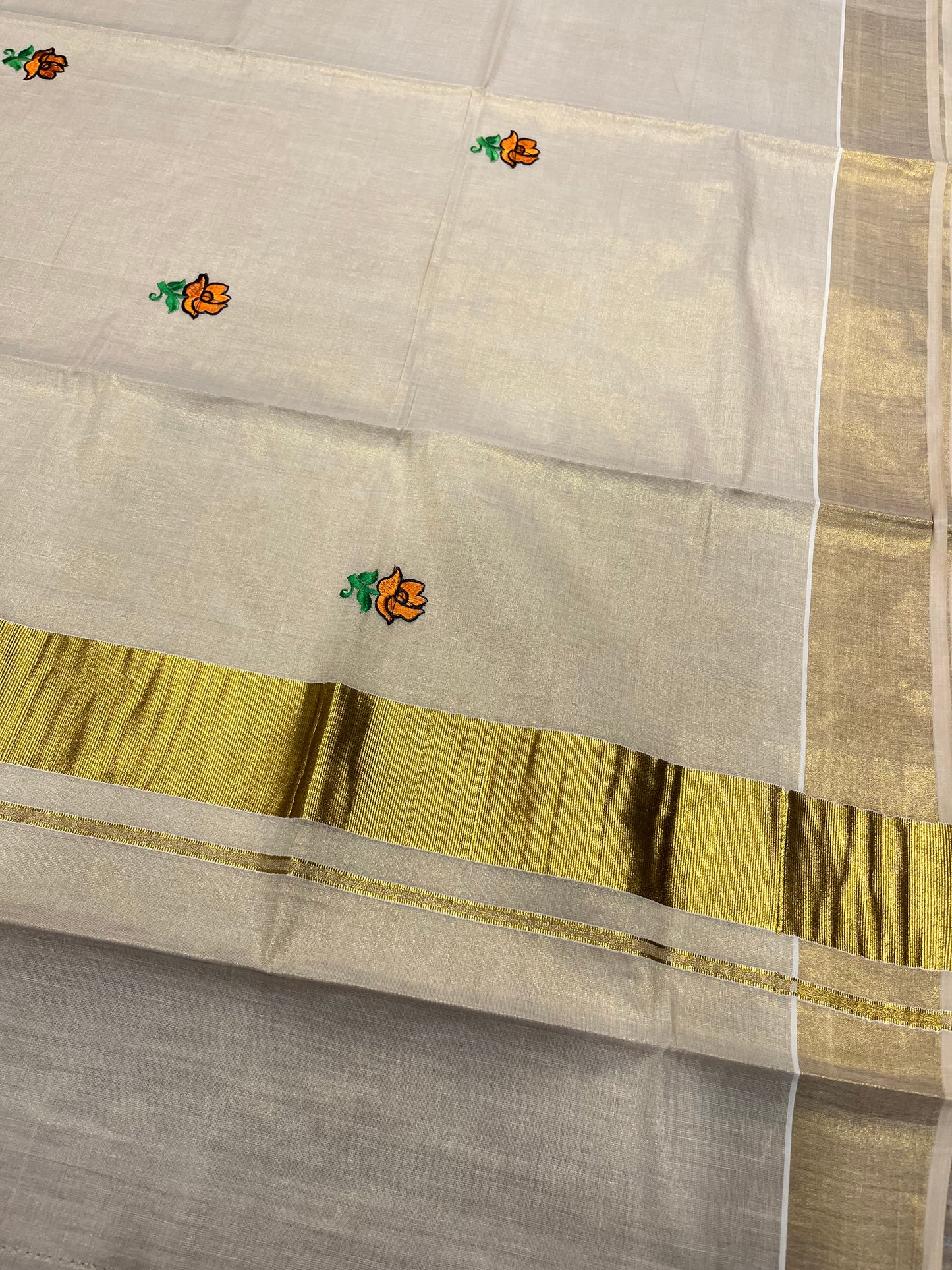 Southloom Tissue Kerala Kasavu Saree with Floral Embroidery Design
