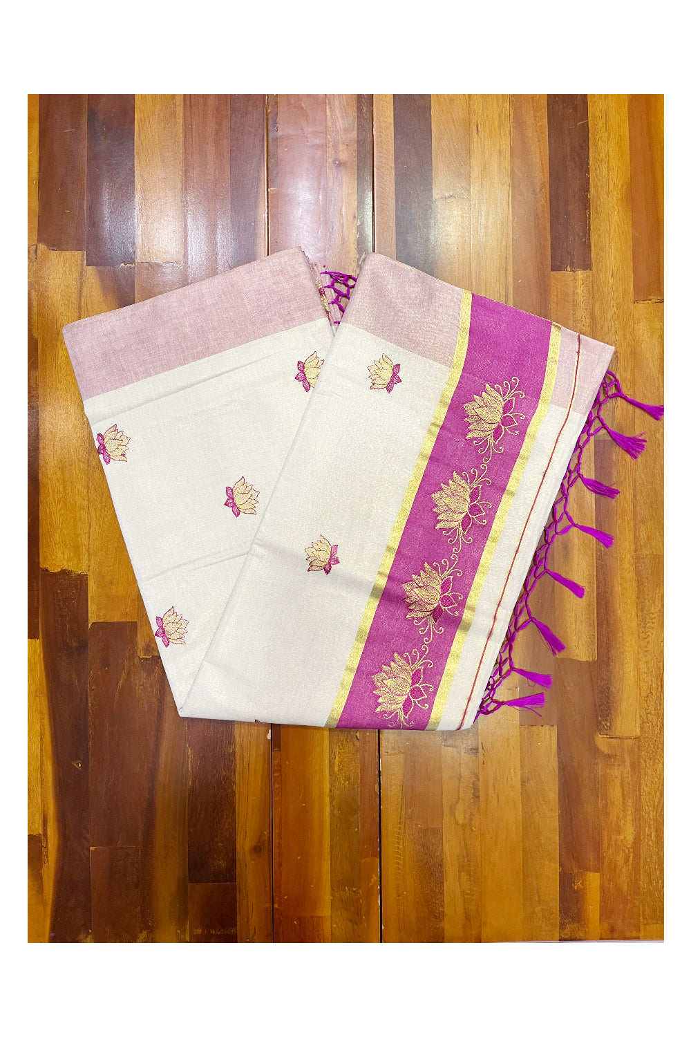 Southloom Kerala Tissue Kasavu Saree with Magenta And Golden Lotus Embroidary Designs on Body