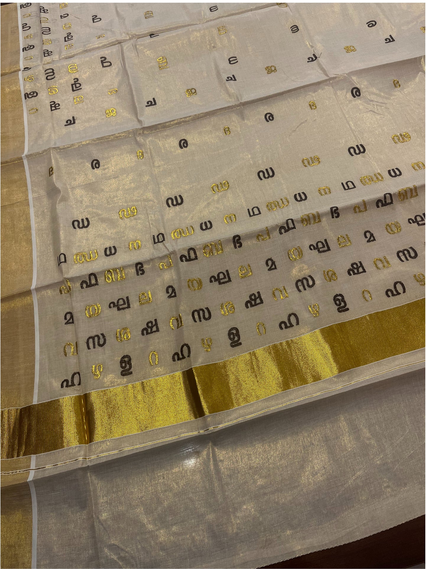 Southloom Kerala Tissue Kasavu Saree with Brown and Gold Malayalam Aksharamala Embroidery Work on Body