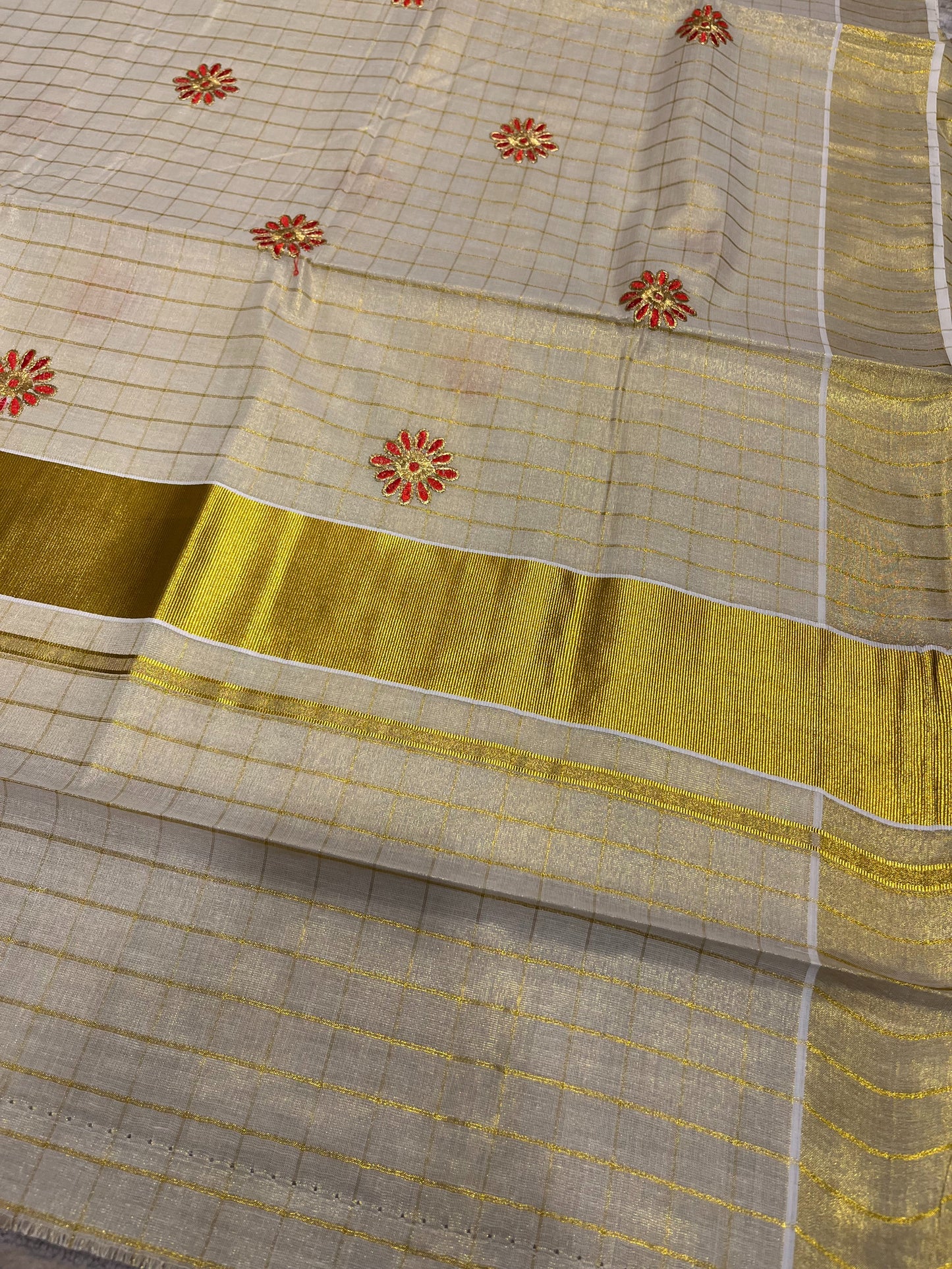 Southloom Tissue Kerala Kasavu Saree with Red Check Floral Print on Border