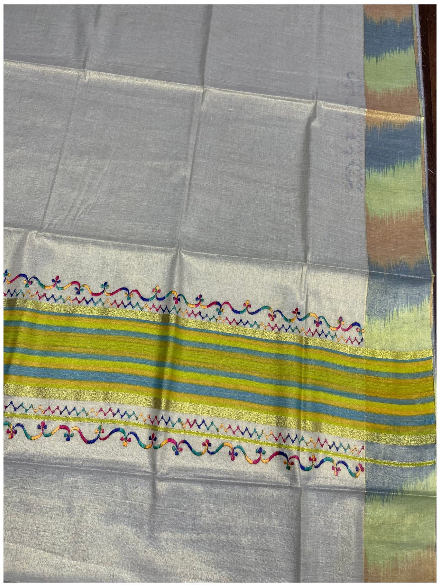 Southloom Kerala Tissue Kasavu Saree with Multi Colour Pochampally Design on Borders and Kara