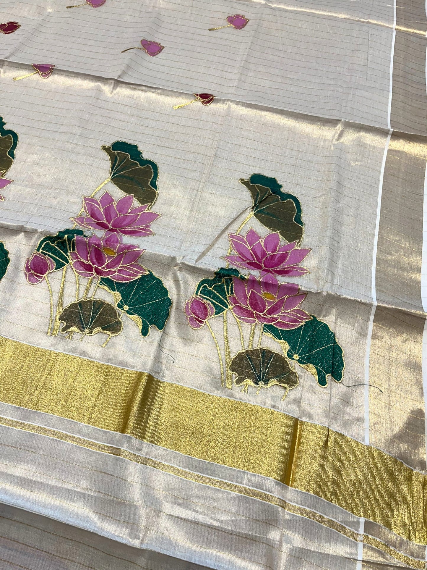 Southloom Tissue Kerala Kasavu Saree with Hand Painted Embroidery Lotus Design