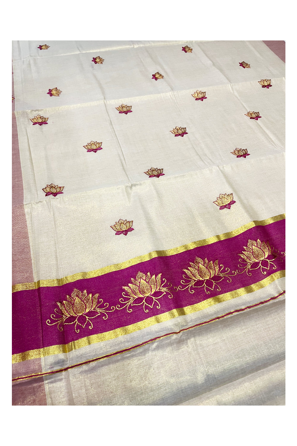 Southloom Kerala Tissue Kasavu Saree with Magenta And Golden Lotus Embroidary Designs on Body