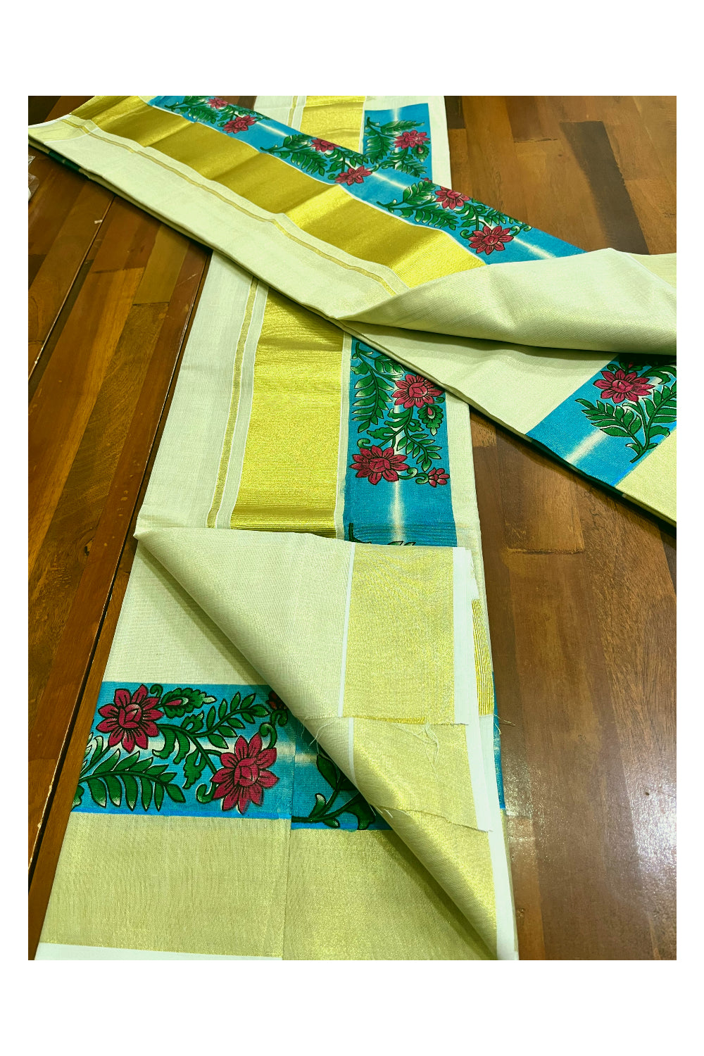 Kerala Tissue Single Set Mundu (Mundum Neriyathum) with Red Floral Block Prints in Blue Border 2.80 Mtrs (Onam 2024 Collection)