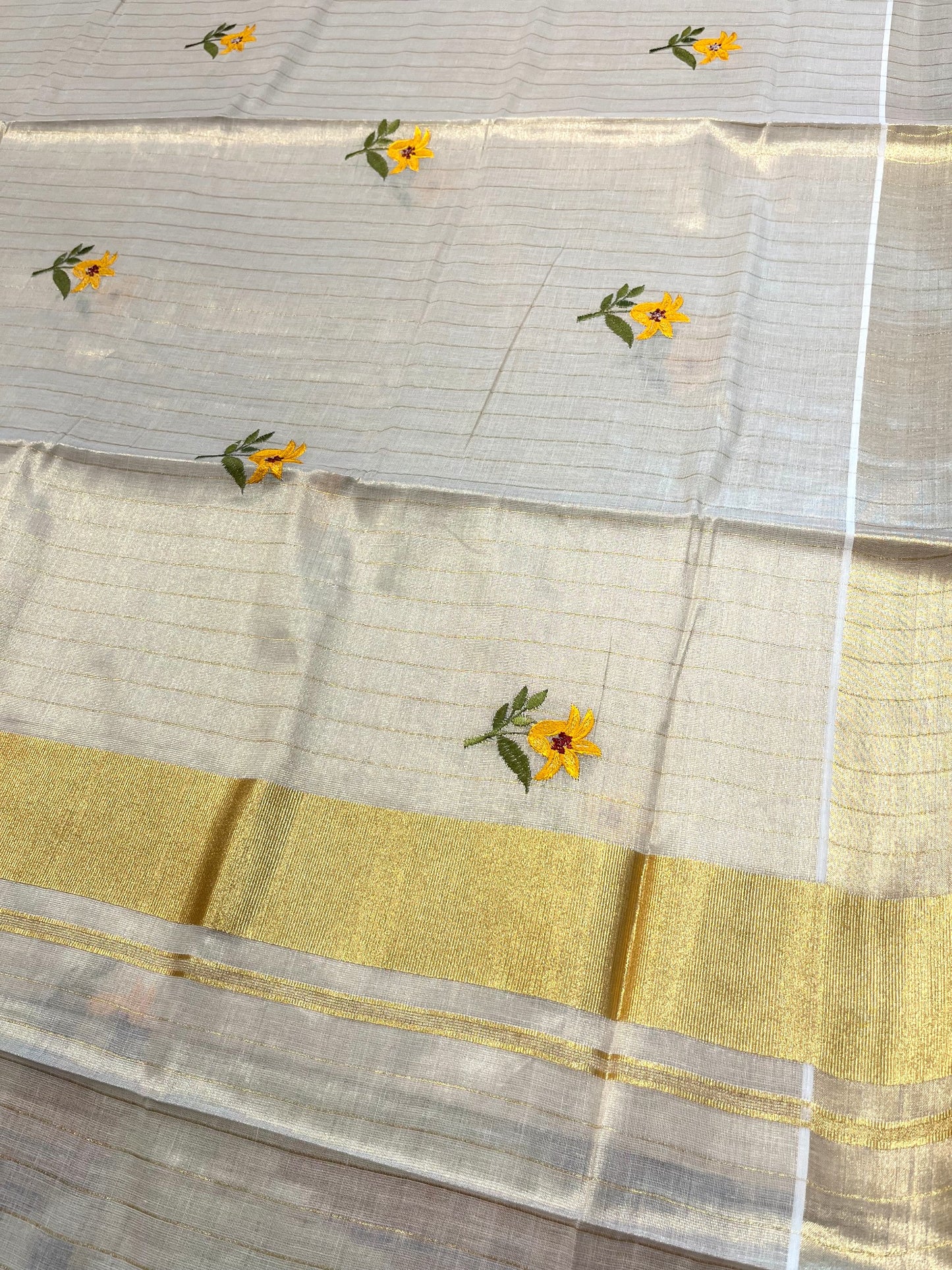 Southloom Tissue Kerala Kasavu Stripes Saree with Yellow Floral Embroidery Design