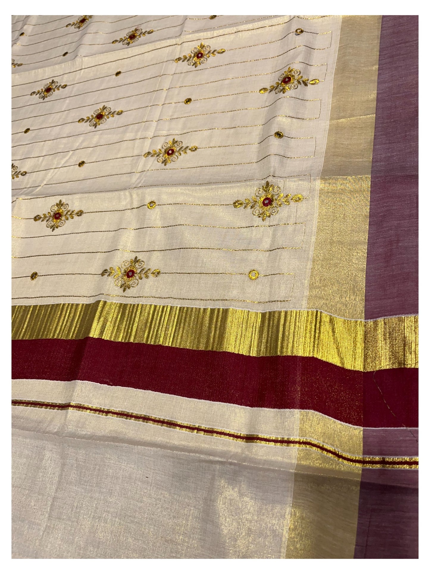 Kerala Tissue Kasavu Lines Saree with Golden And Maroon Embroidery Works