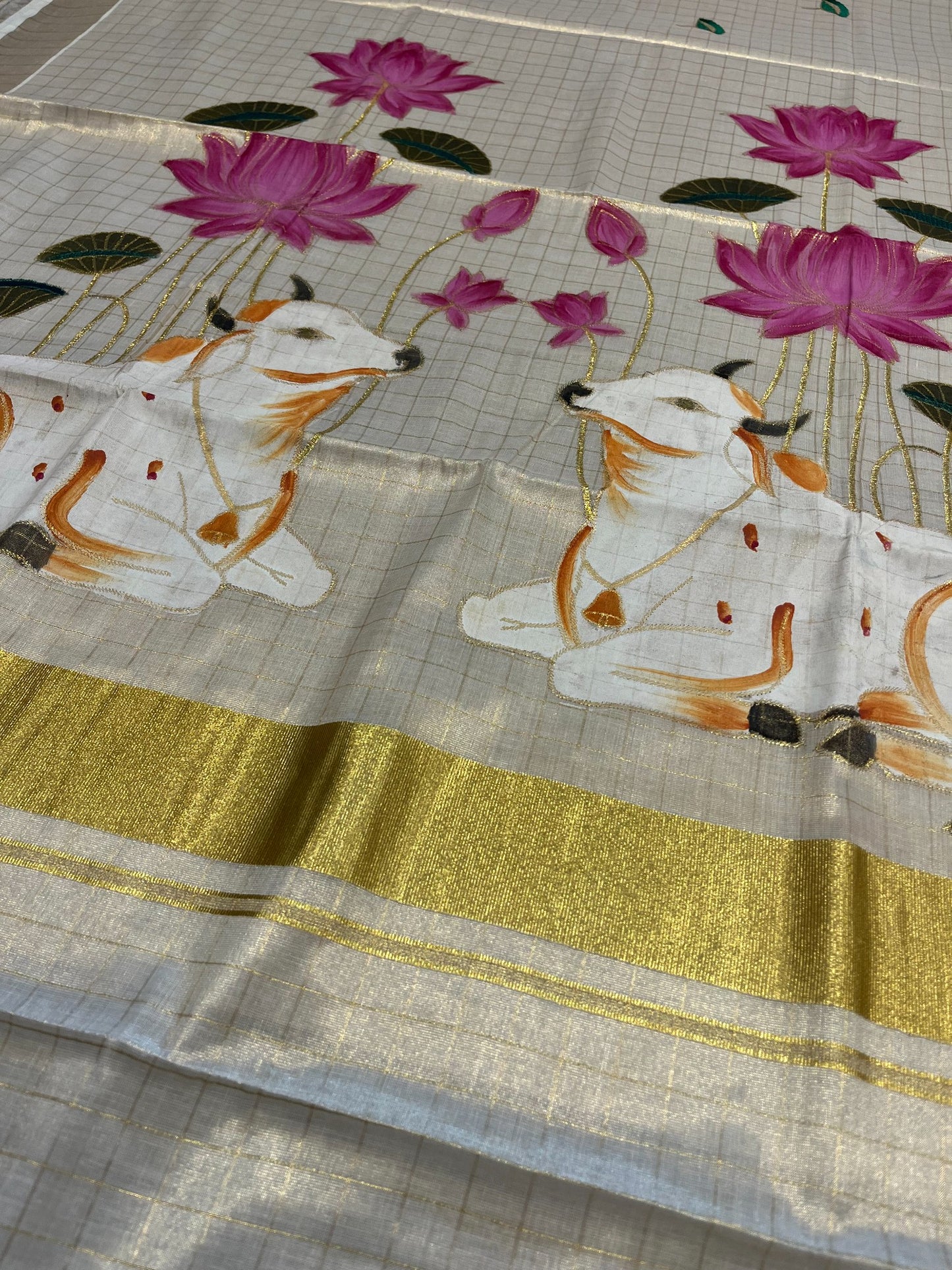 Southloom Tissue Kerala Kasavu Saree with Check Hand Painted Embroidery Nandi and Lotus Design