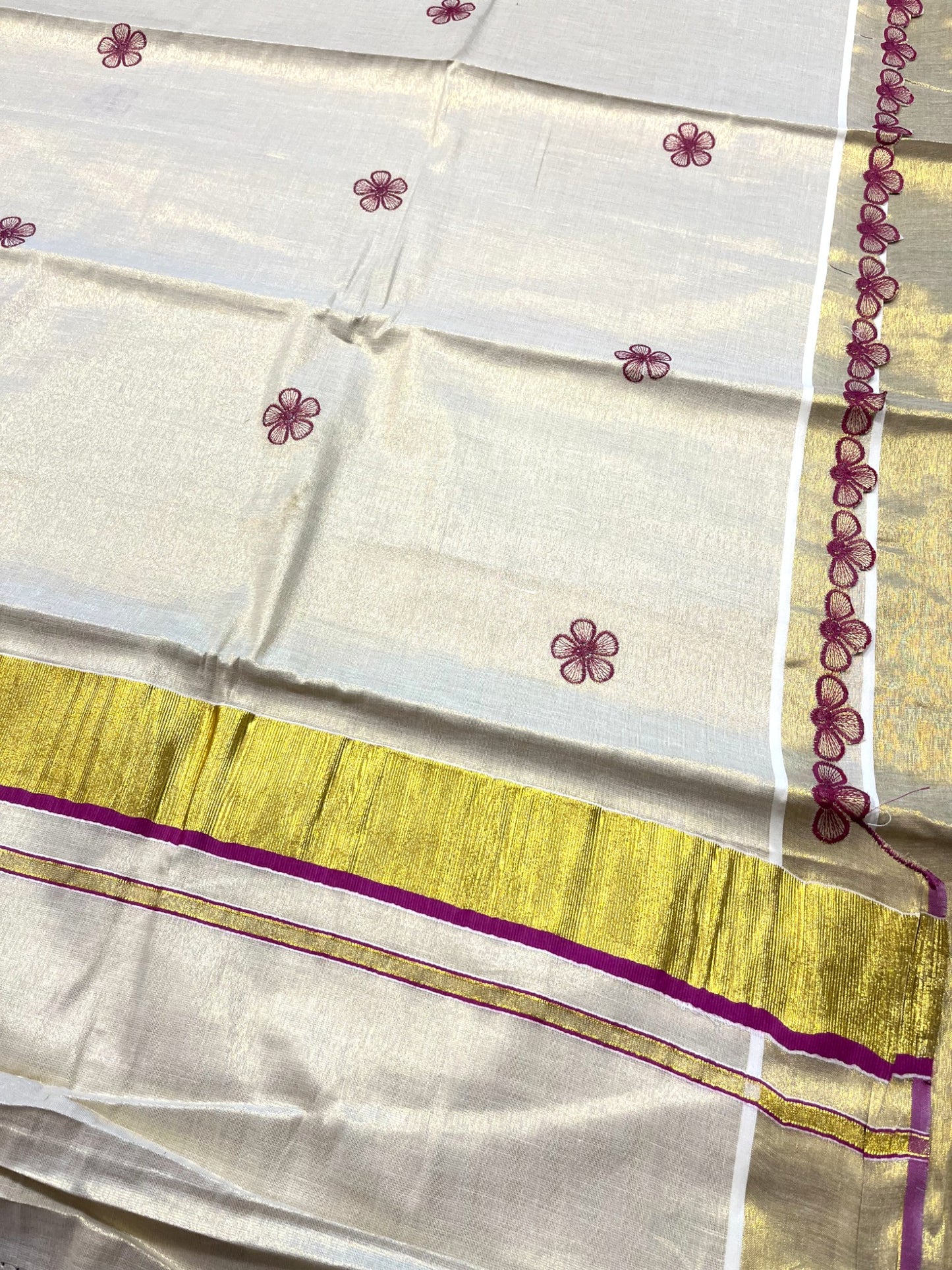 Southloom Kerala Tissue Kasavu Saree with Magenta Floral Embroidery on Body and Border