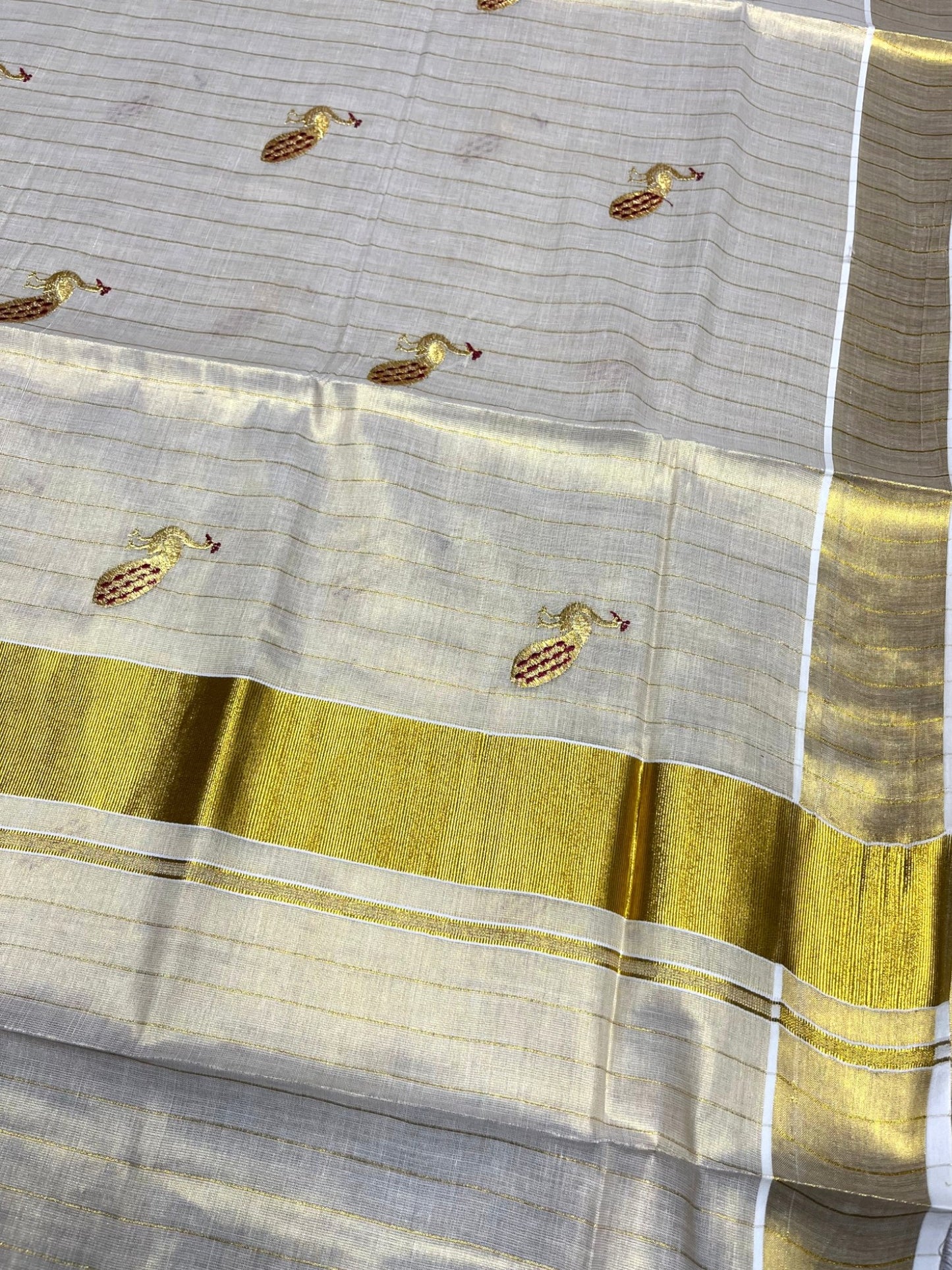 Southloom Tissue Kerala Kasavu Lines Saree with Peacock Embroidery Work on Body in Maroon