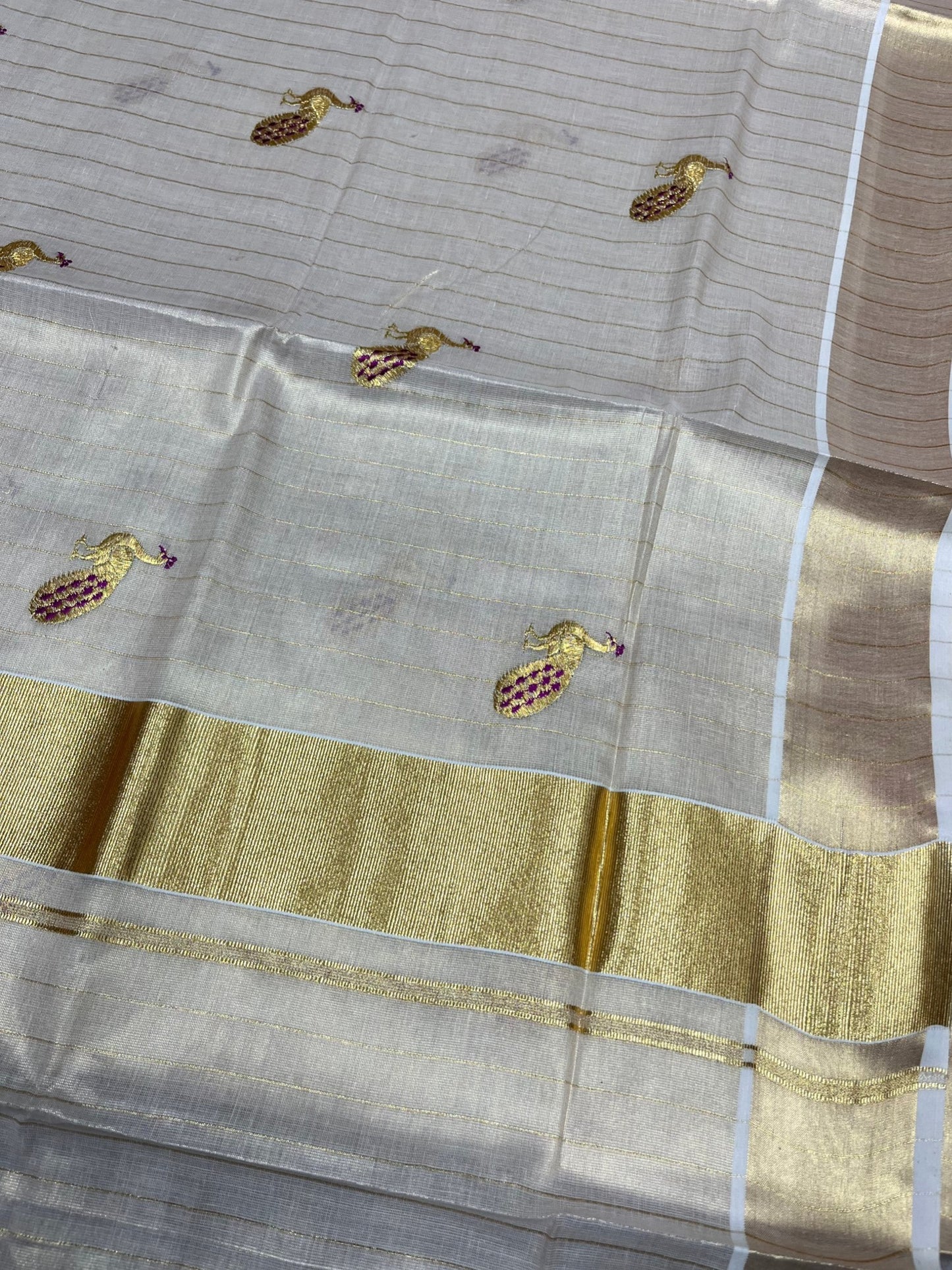 Southloom Tissue Kerala Kasavu Lines Saree with Peacock Embroidery Work on Body in Magenta