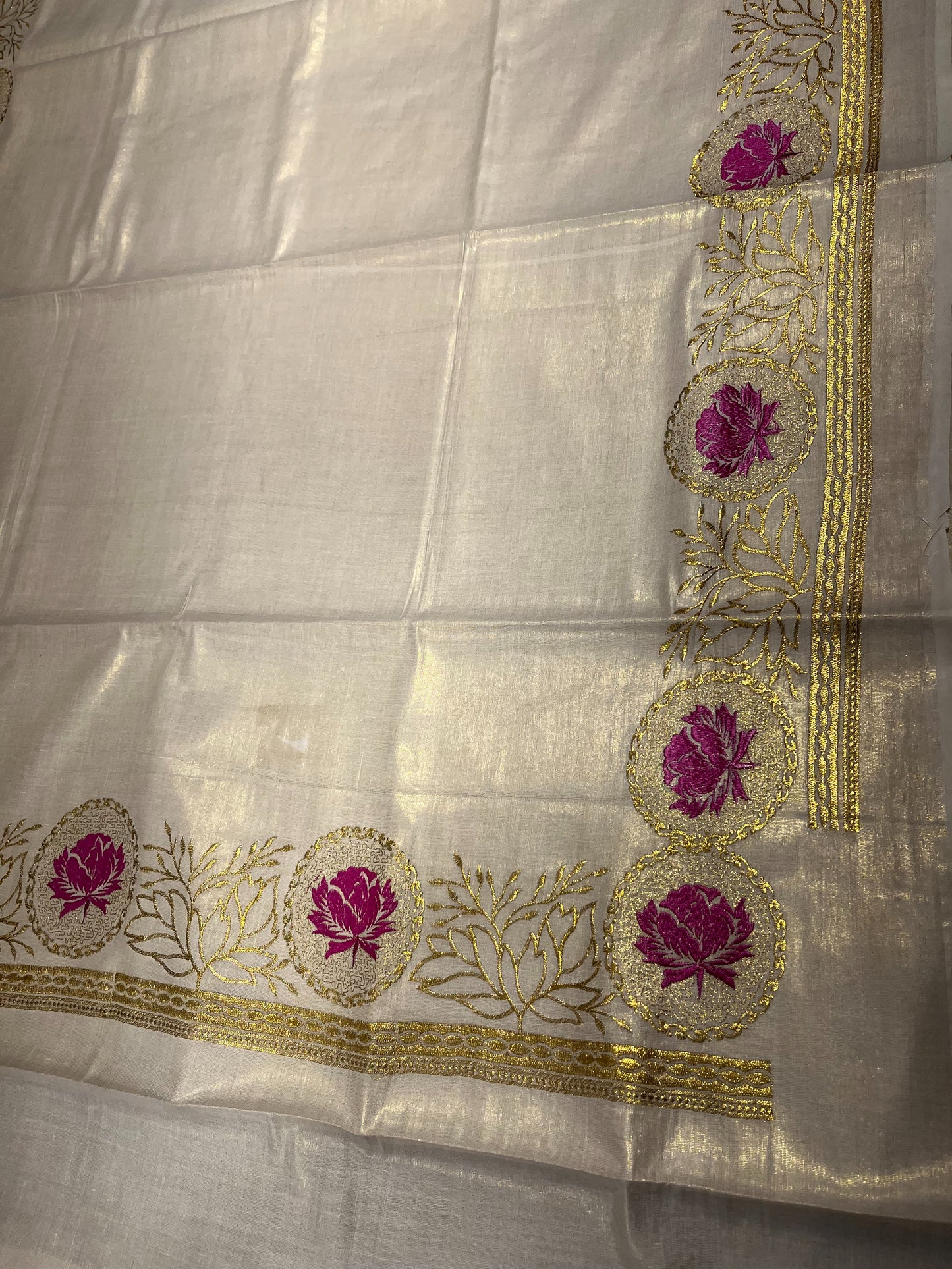 Southloom Kerala Tissue Kasavu Plain Saree with Magenta Floral Embroidery Works